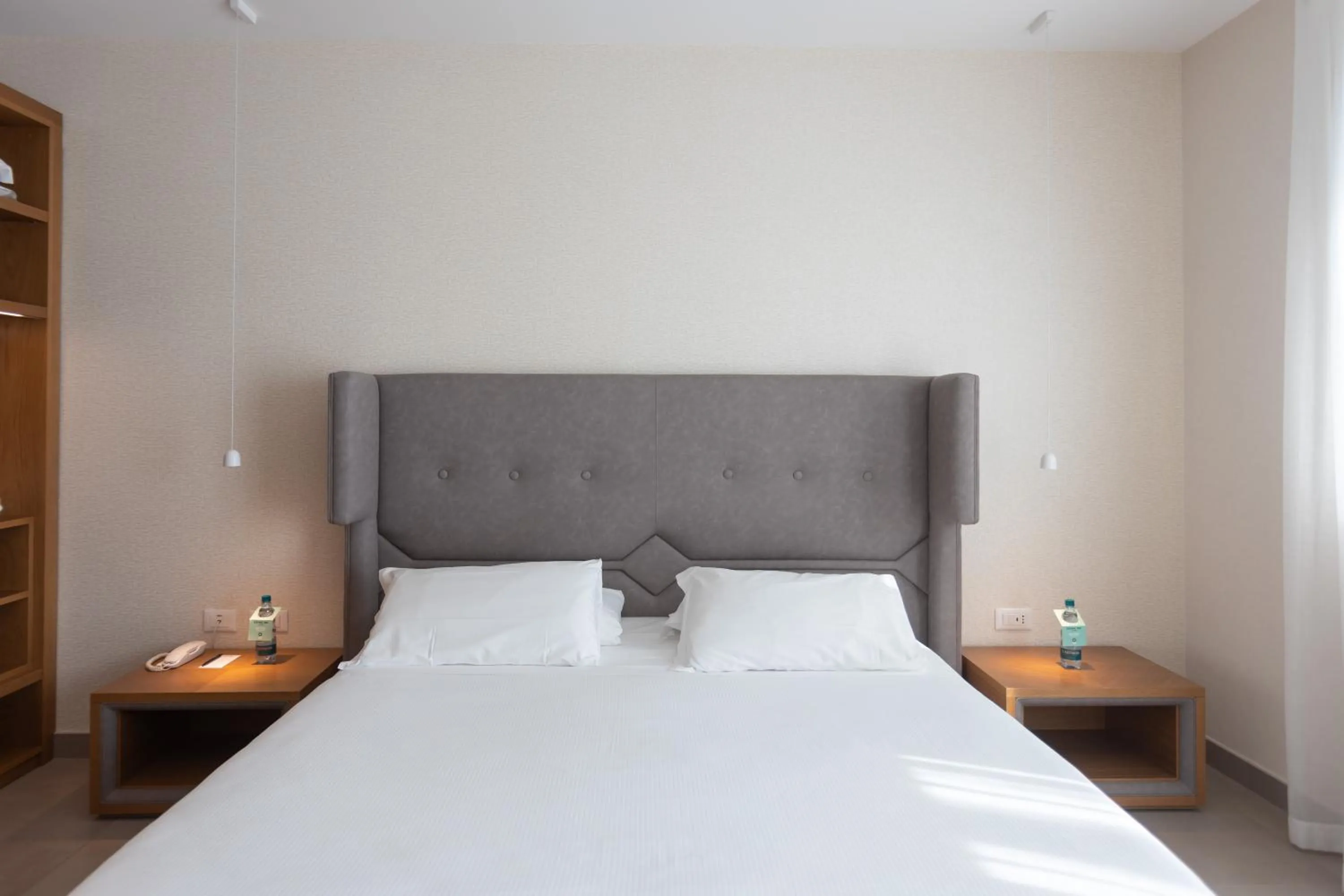 Bed in Mosella Suite Hotel