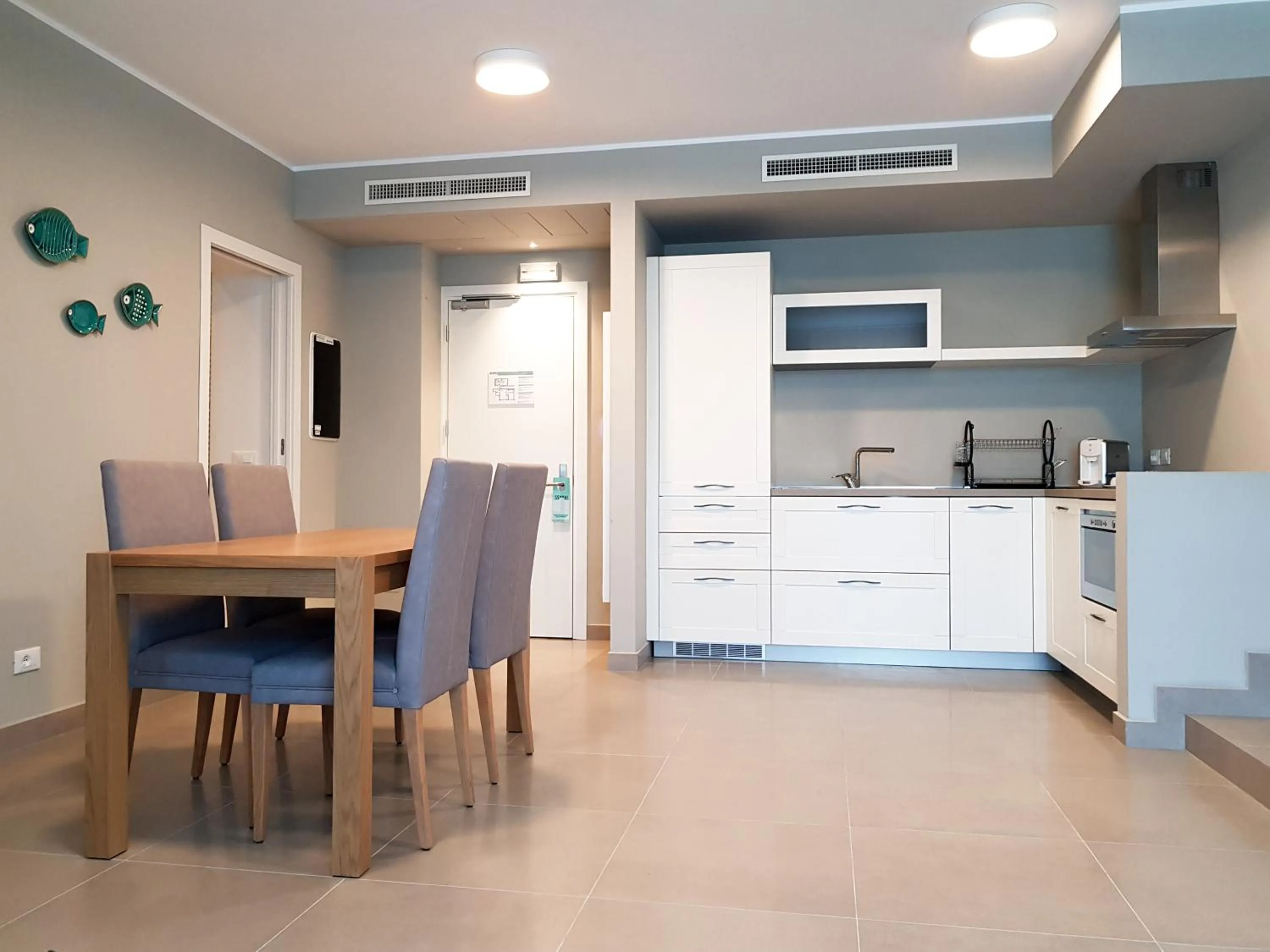 Kitchen or kitchenette in Mosella Suite Hotel