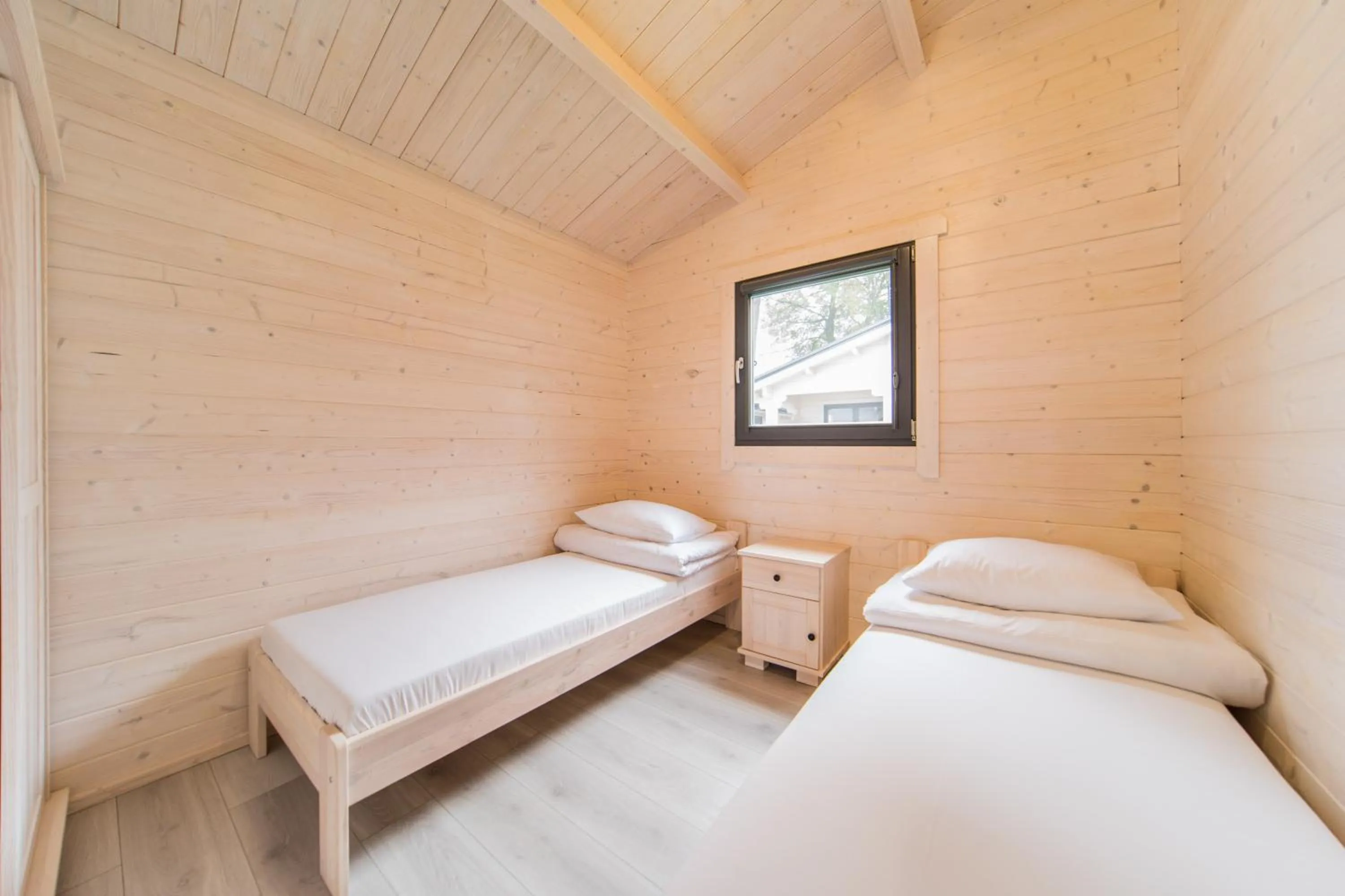 Bed in Family-Holiday Spa&Resort