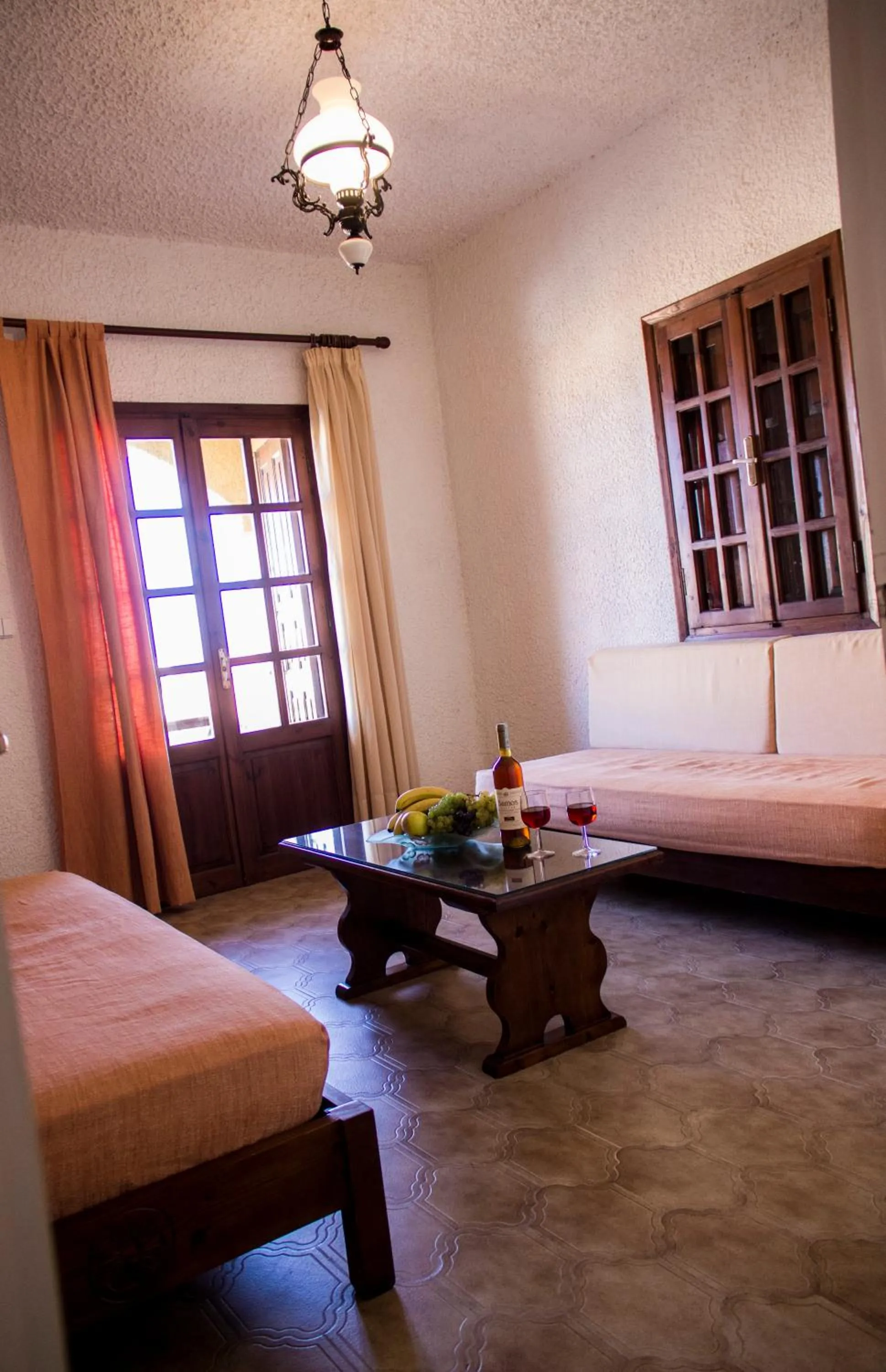 Living room, Bed in Hesperia Hotel