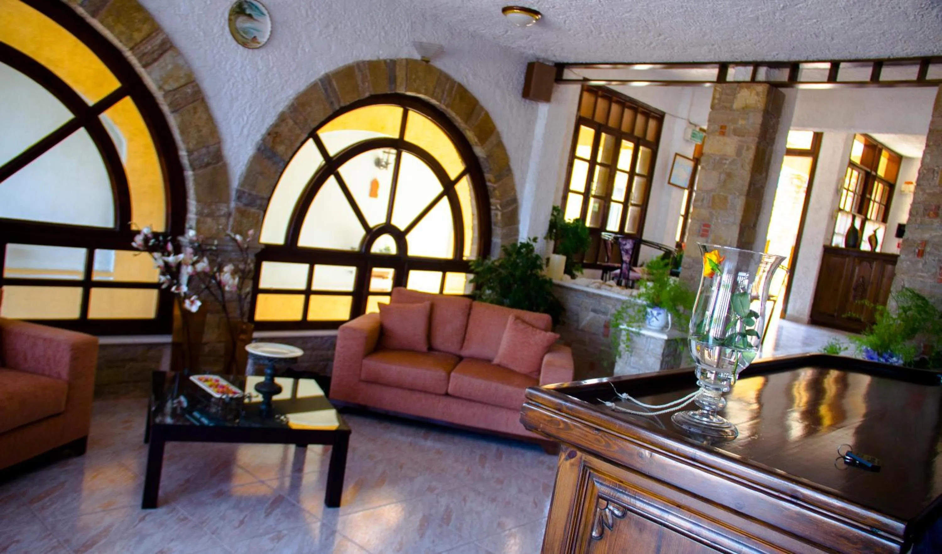 Communal lounge/ TV room in Hesperia Hotel