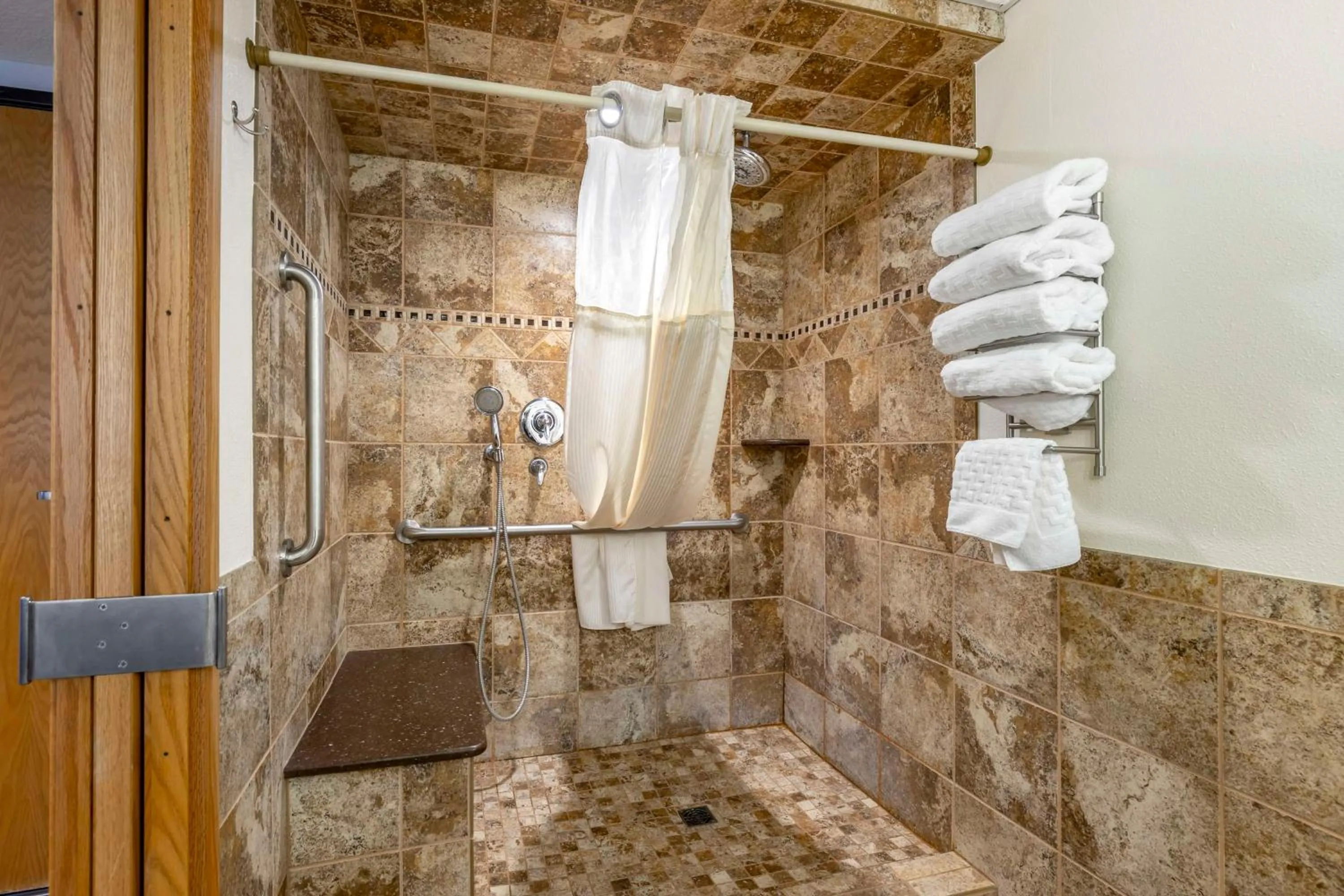 Bathroom in Best Western Plus Longbranch Hotel & Convention Center