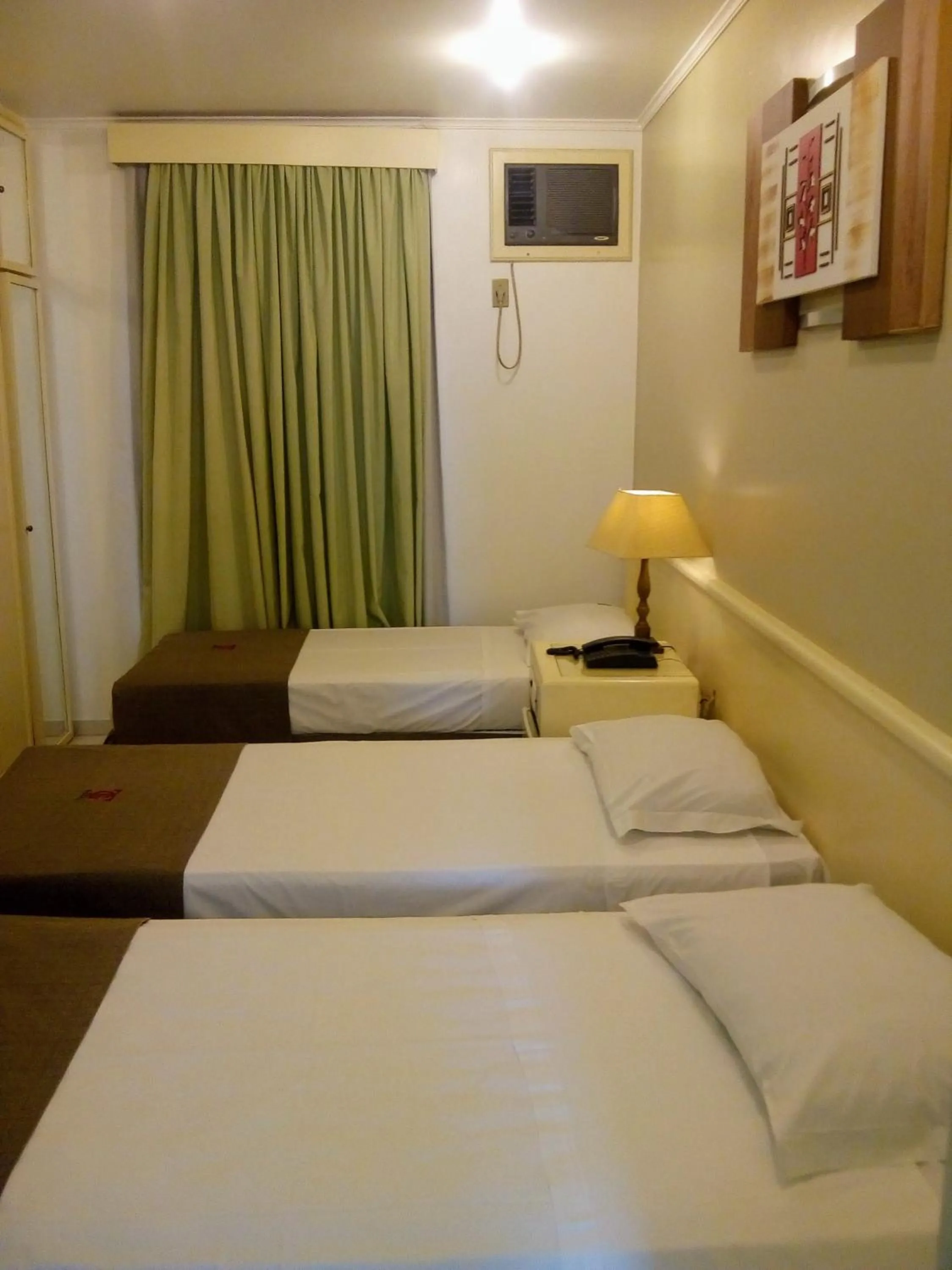 Bed in Trade Garden Hotel