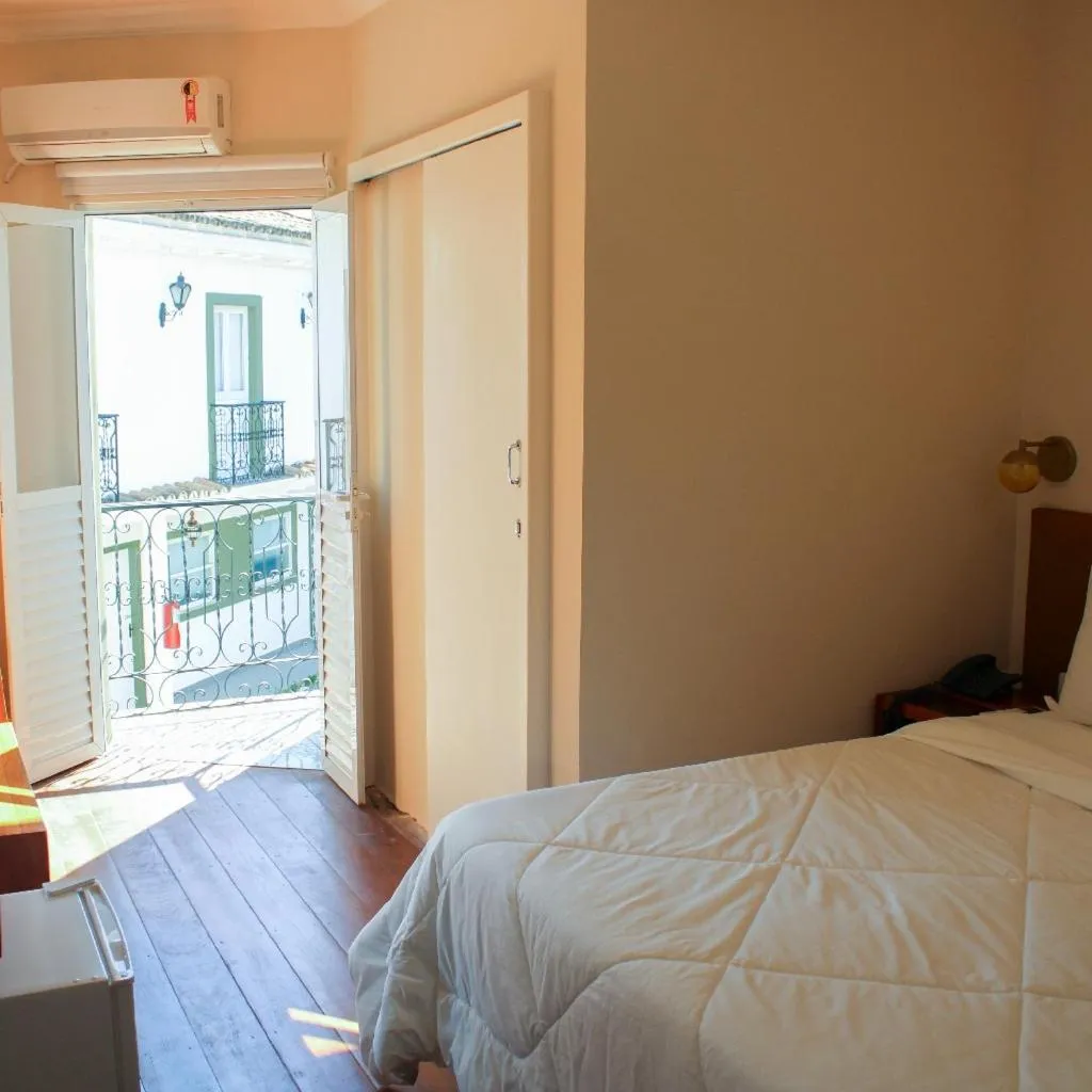 Bed in Pousada Mãe D'Água