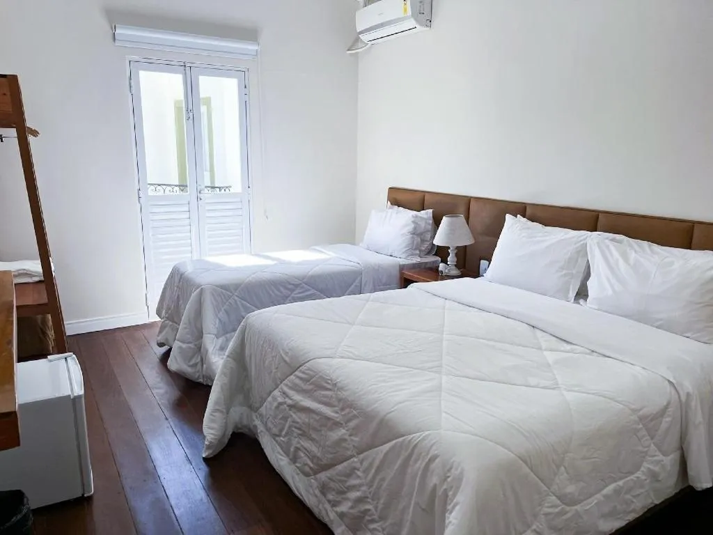 Bed in Pousada Mãe D'Água