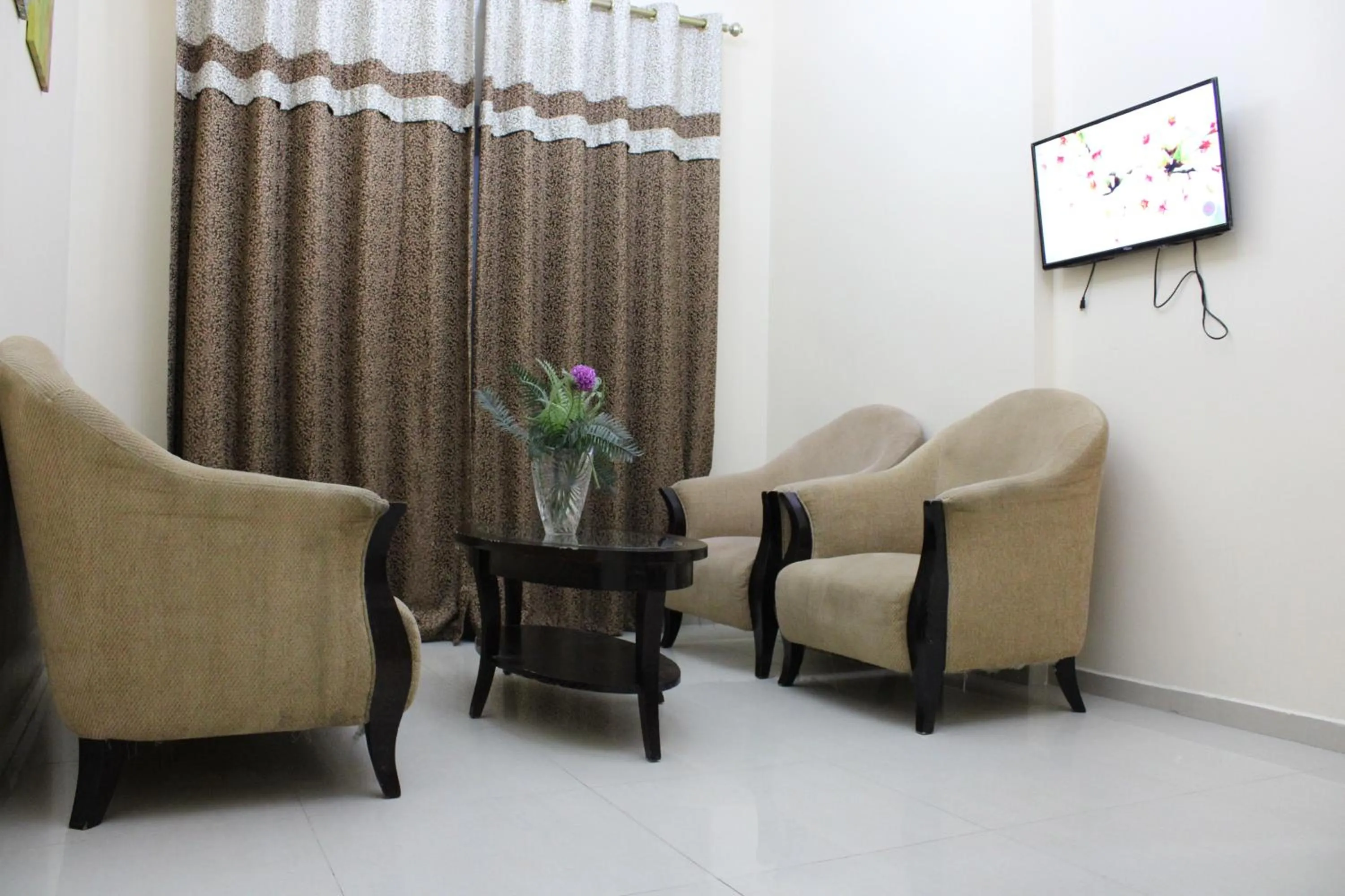 Living room in Al Smou Hotel Apartments - MAHA HOSPITALITY GROUP