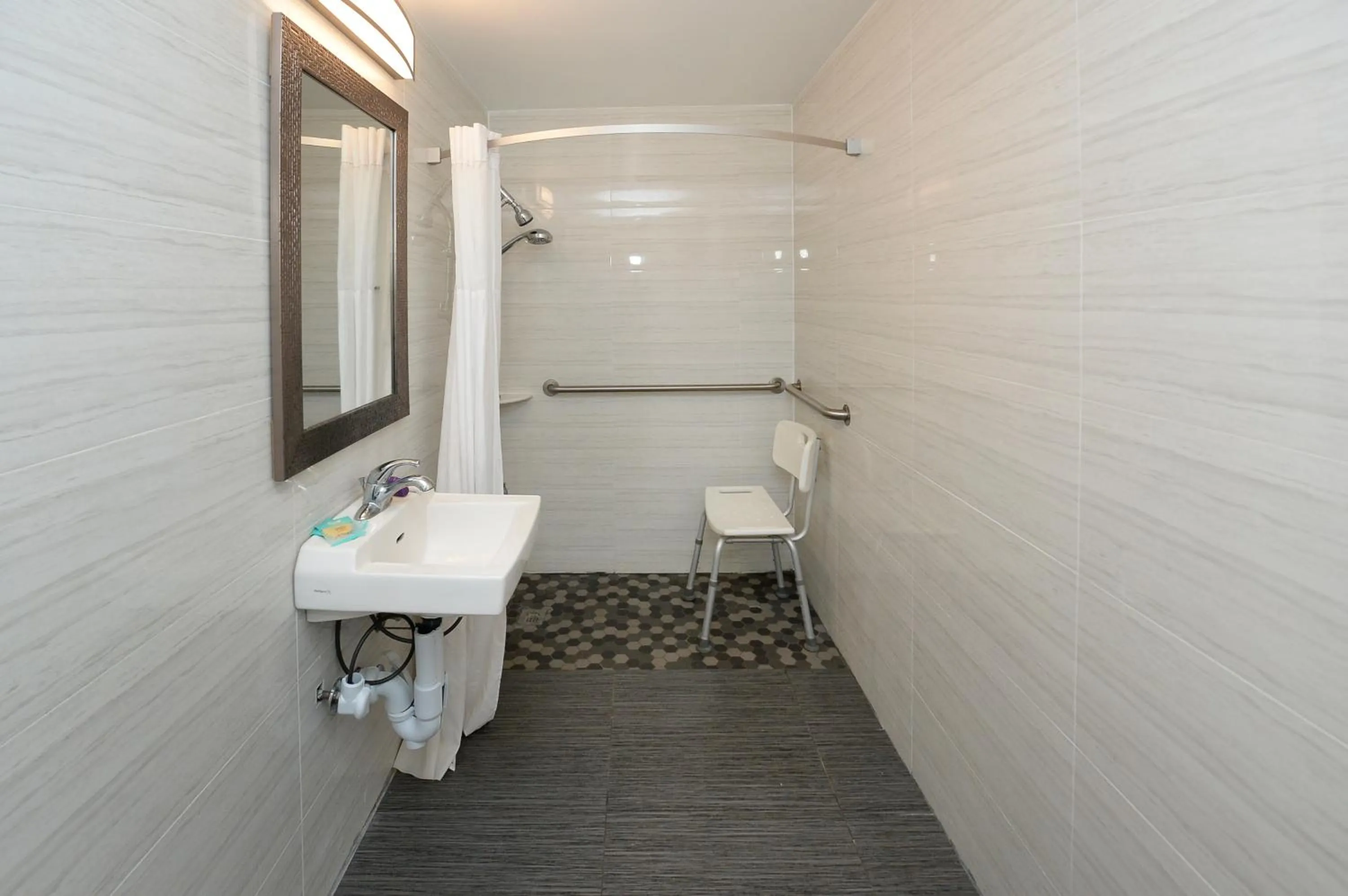 Shower in Americas Best Value Inn at Central Valley-Woodbury