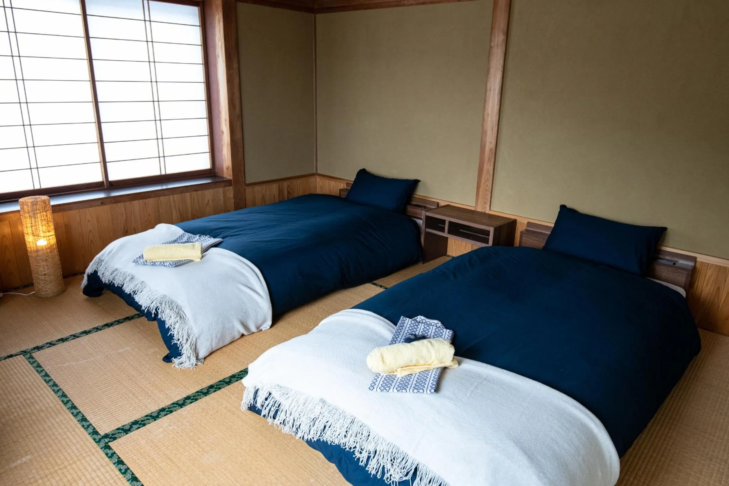 Bed in Toemu Nozawa Lodge