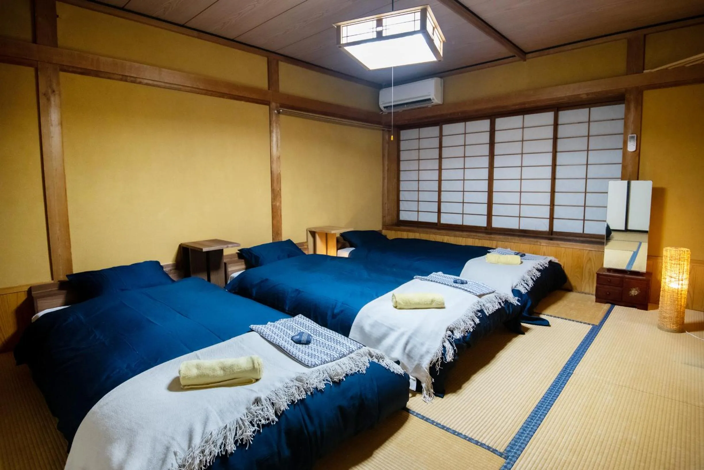 Bed in Toemu Nozawa Lodge
