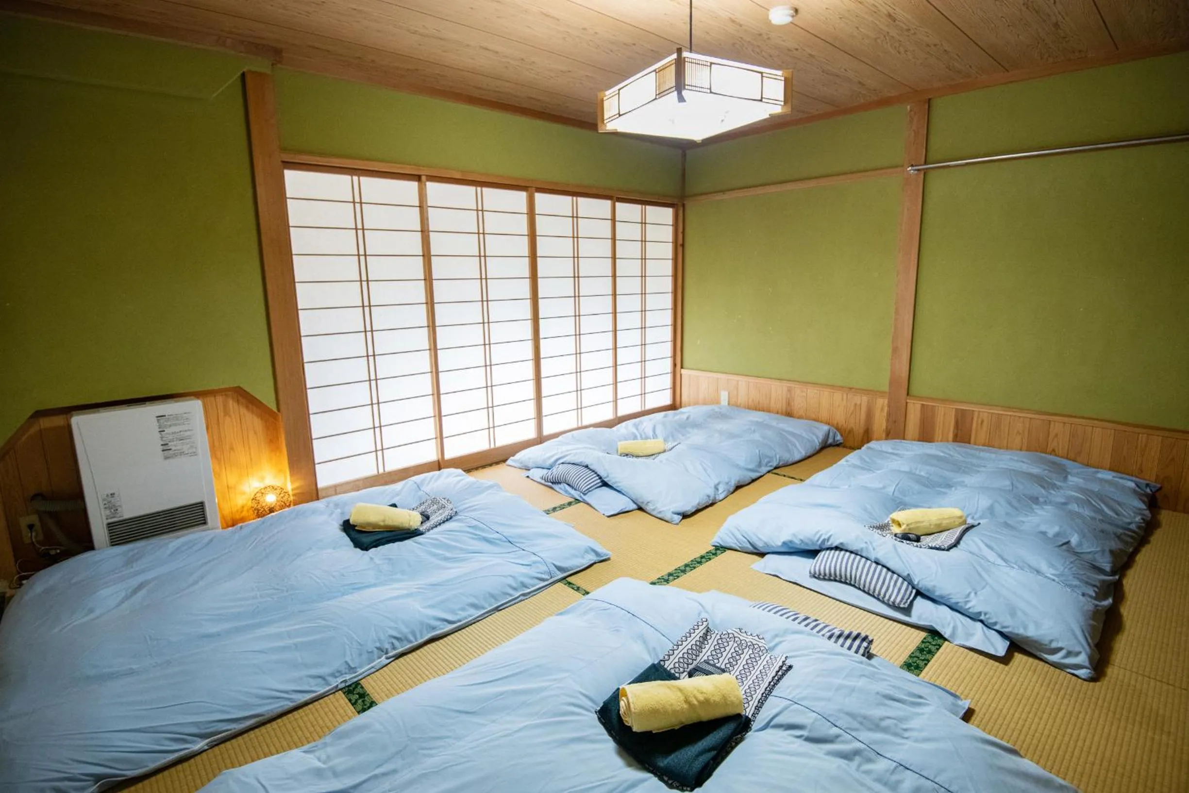 Bed in Toemu Nozawa Lodge