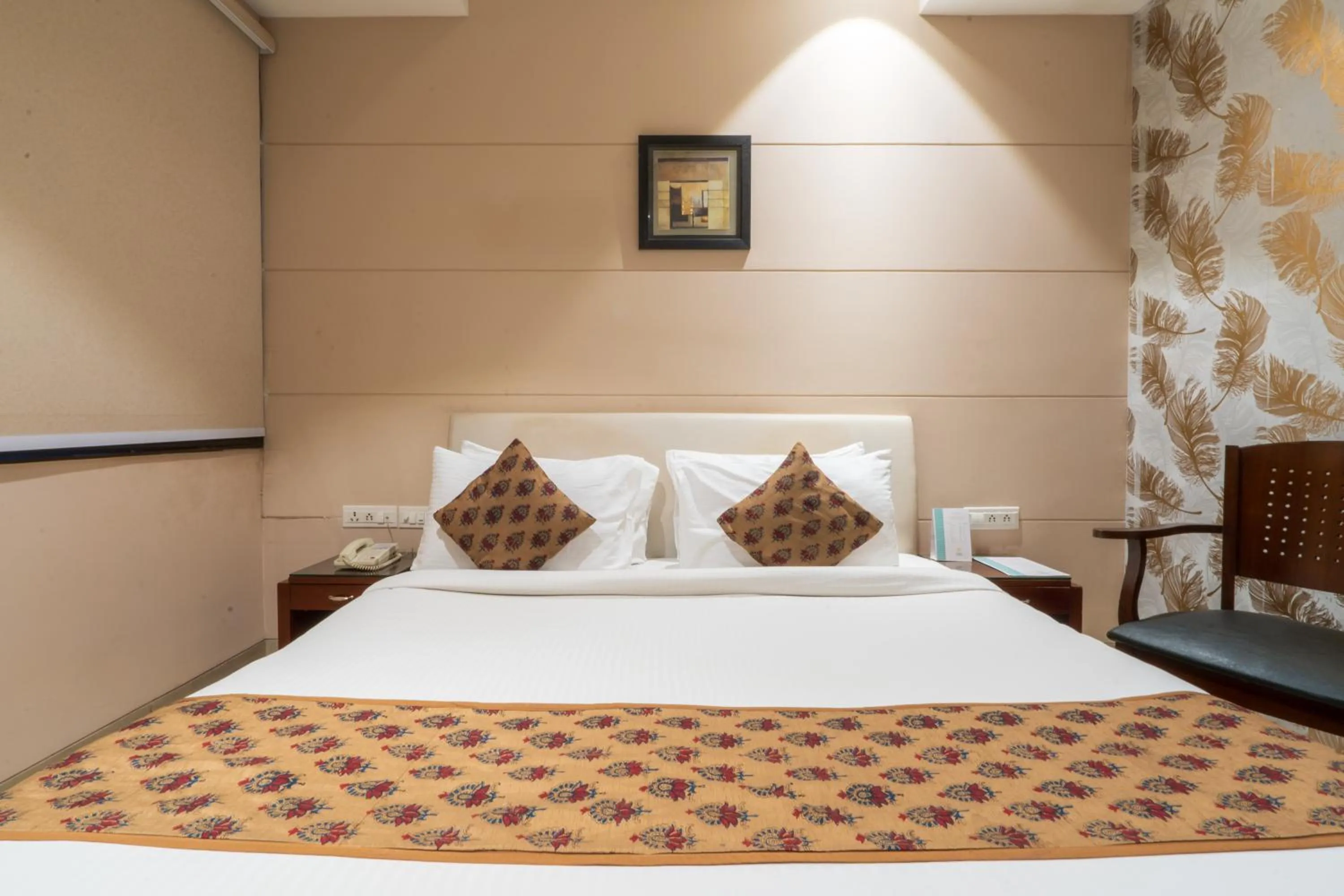 Bedroom, Bed in Cosy Grand, Chanakyapuri by The Cosy Hotels