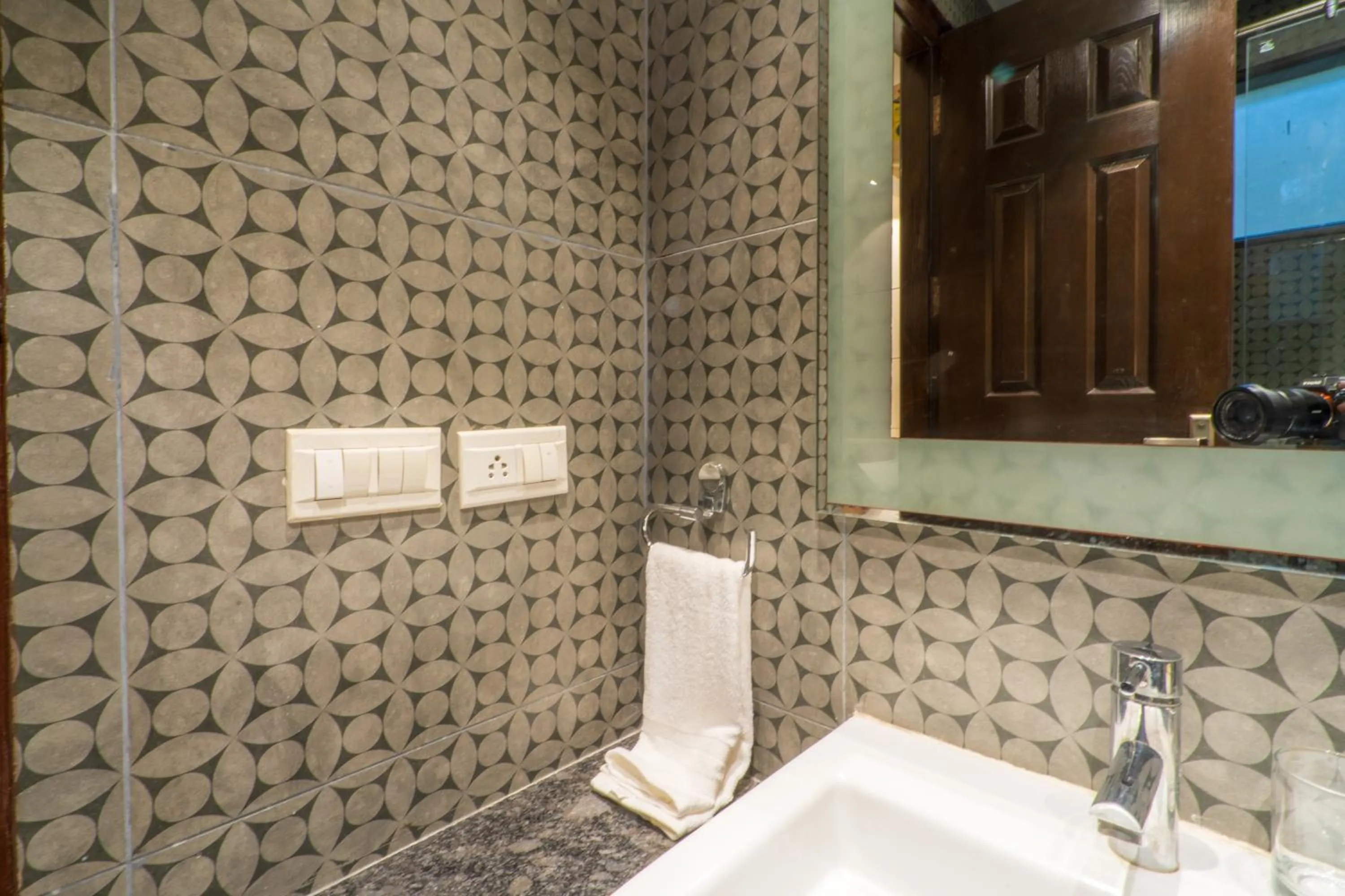 Bathroom in Cosy Grand, Chanakyapuri by The Cosy Hotels