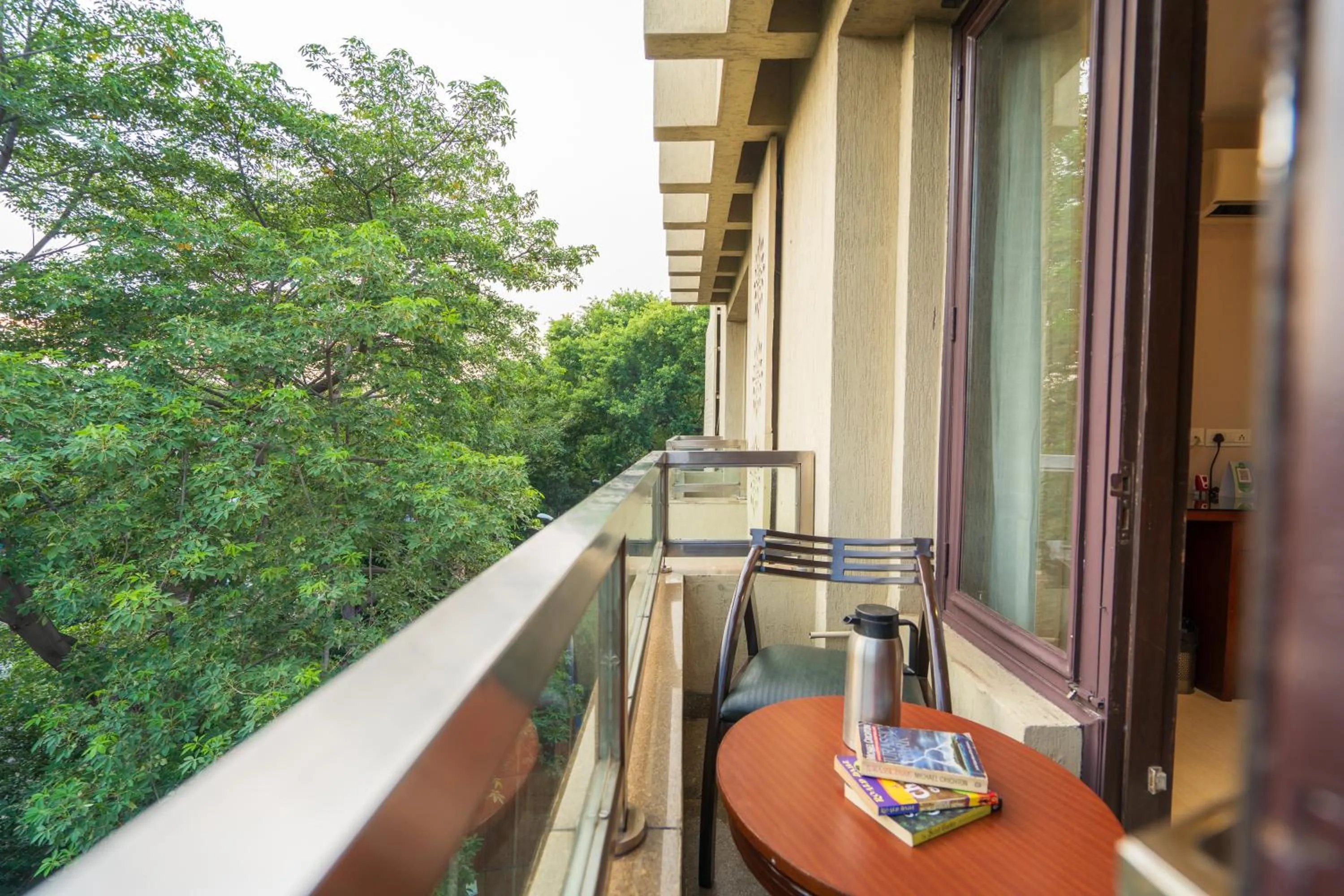 Balcony/Terrace in Cosy Grand, Chanakyapuri by The Cosy Hotels