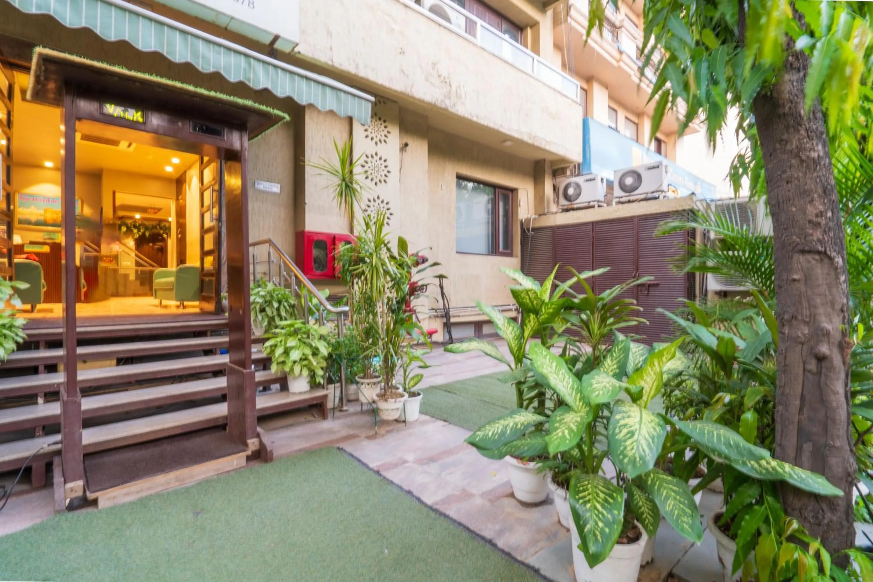 Property building in Cosy Grand, Chanakyapuri by The Cosy Hotels