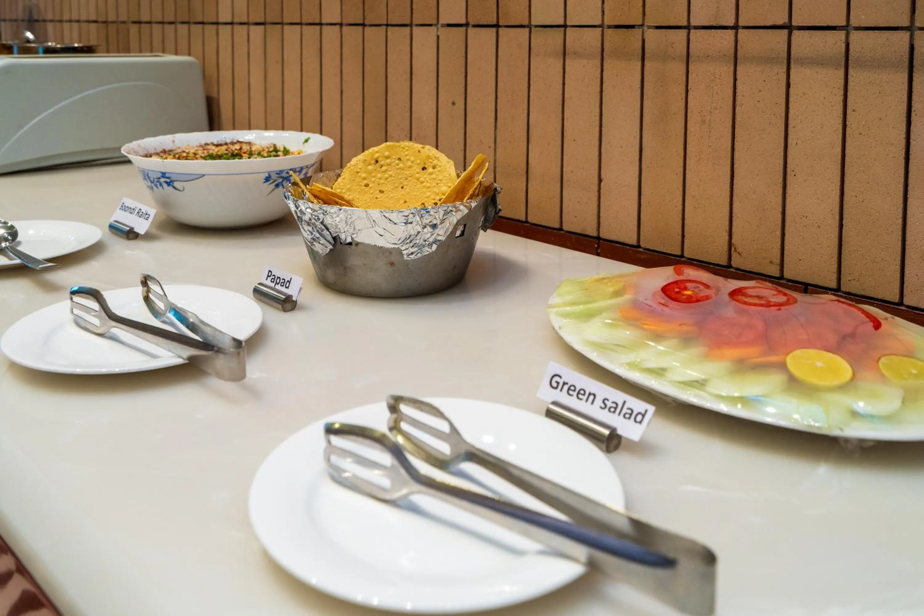 Food in Cosy Grand, Chanakyapuri by The Cosy Hotels