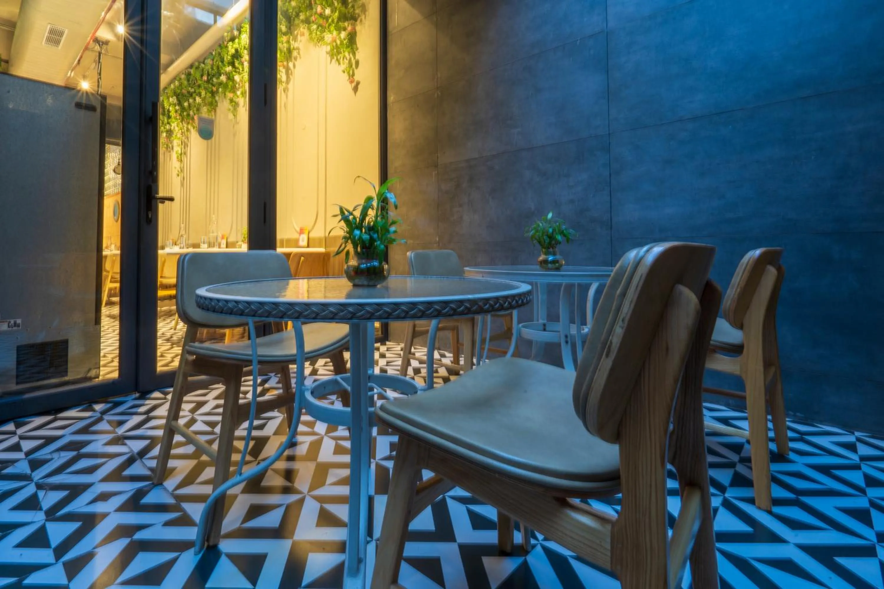 Seating area in Cosy Grand, Chanakyapuri by The Cosy Hotels