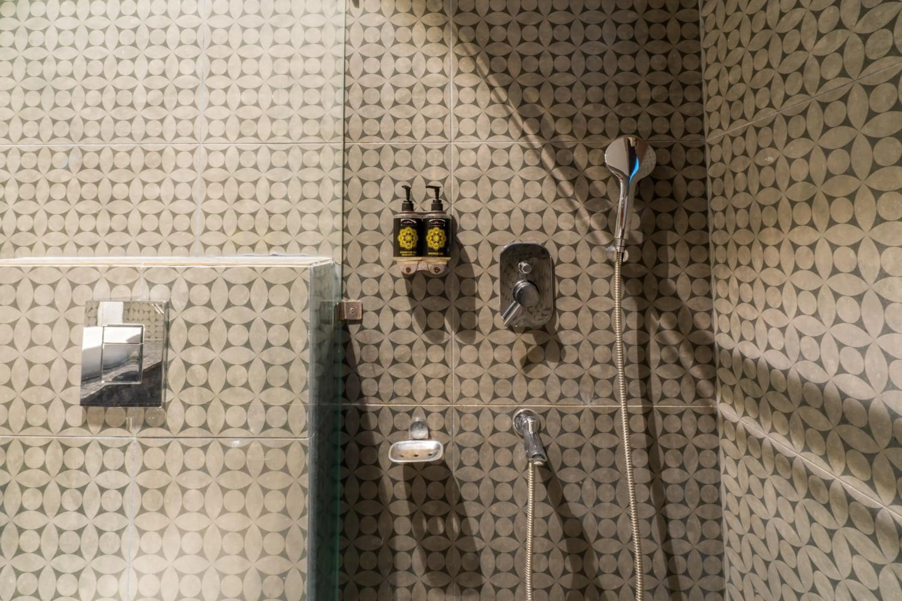 Bathroom in Cosy Grand, Chanakyapuri by The Cosy Hotels