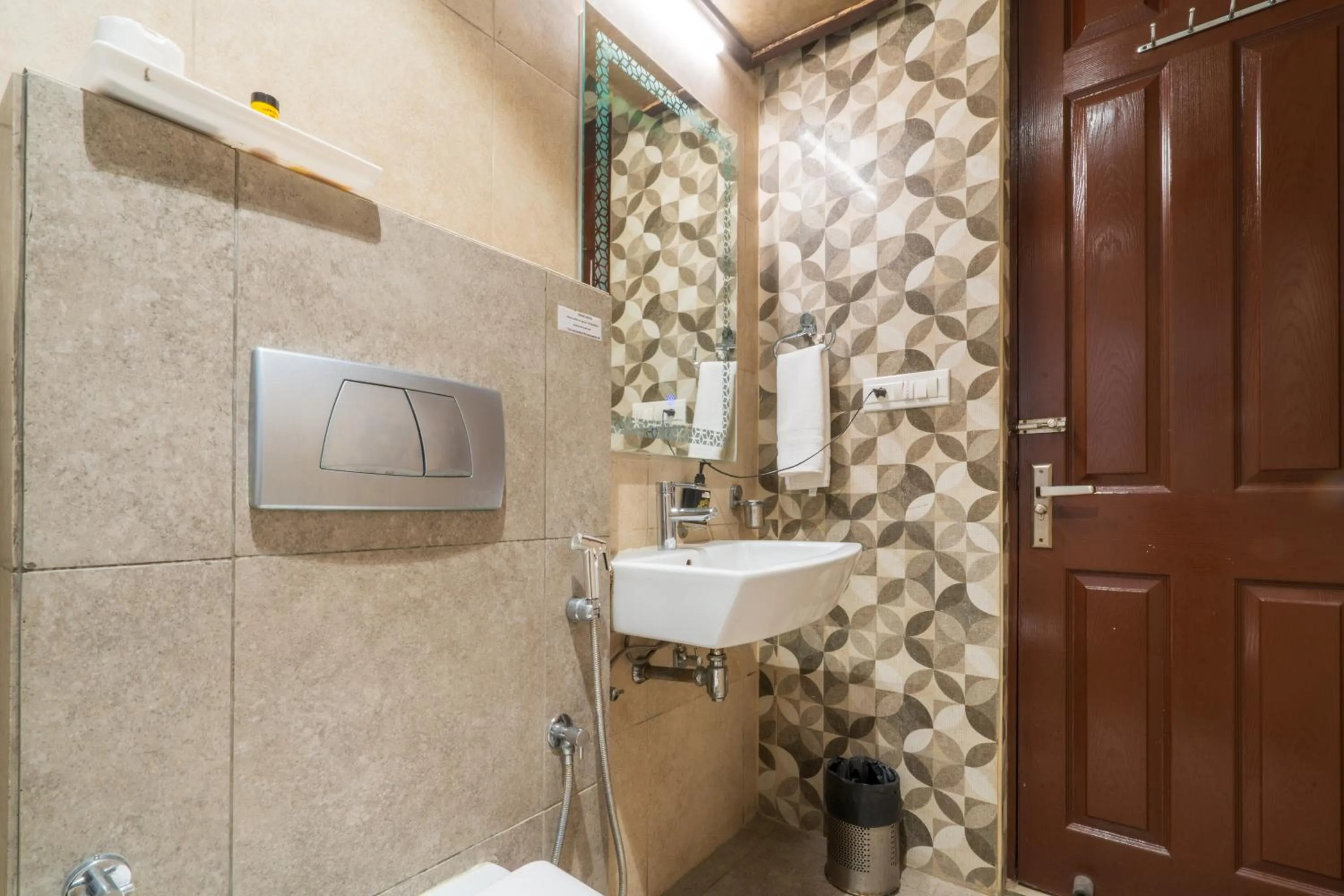 Bathroom in Cosy Grand, Chanakyapuri by The Cosy Hotels