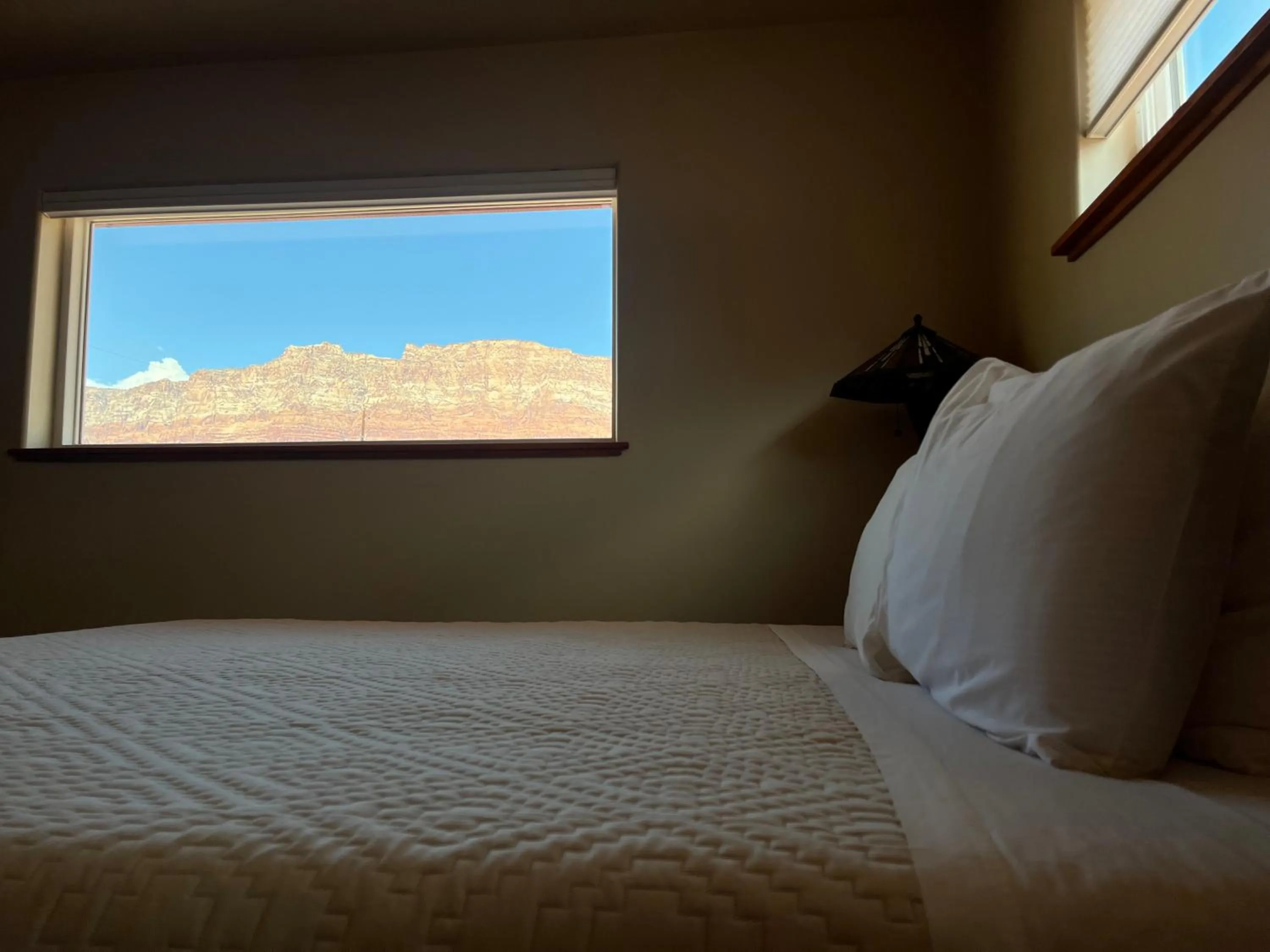 View (from property/room), Bed in Lee's Ferry Lodge at Vermilion Cliffs