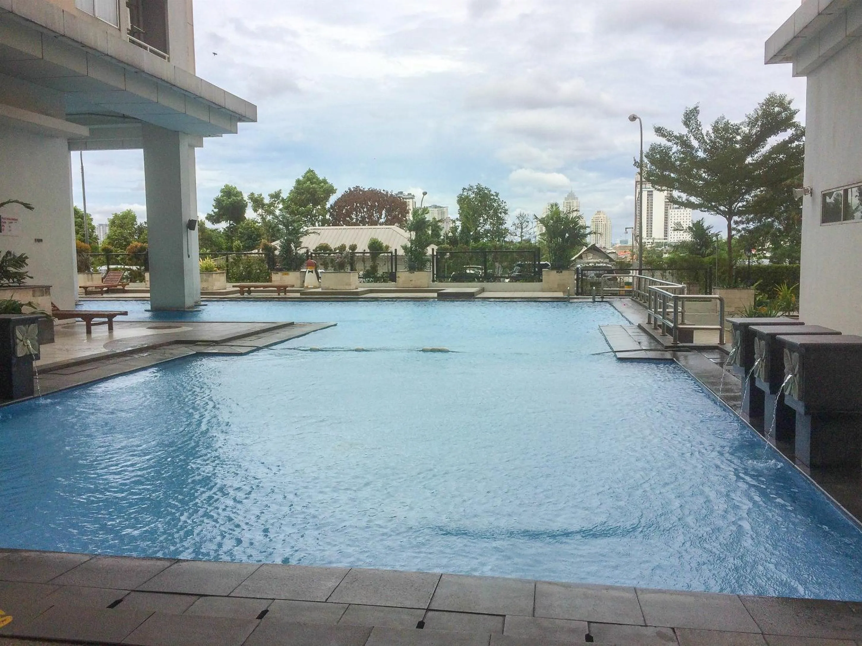 Swimming pool in Modern and Stylish 2BR Pakubuwono Terrace Apartment By Travelio