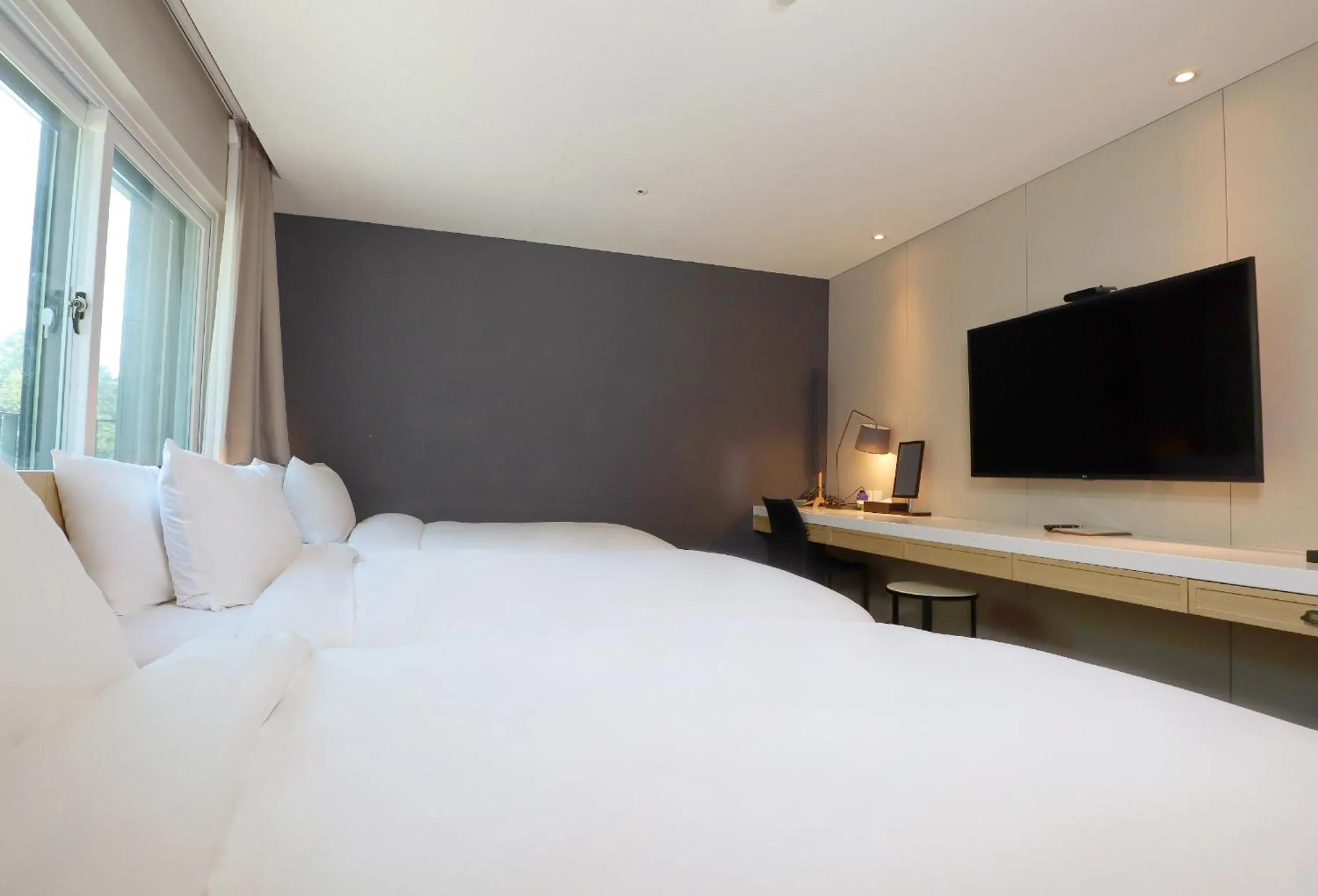 Bed in Eden Paradise Hotel