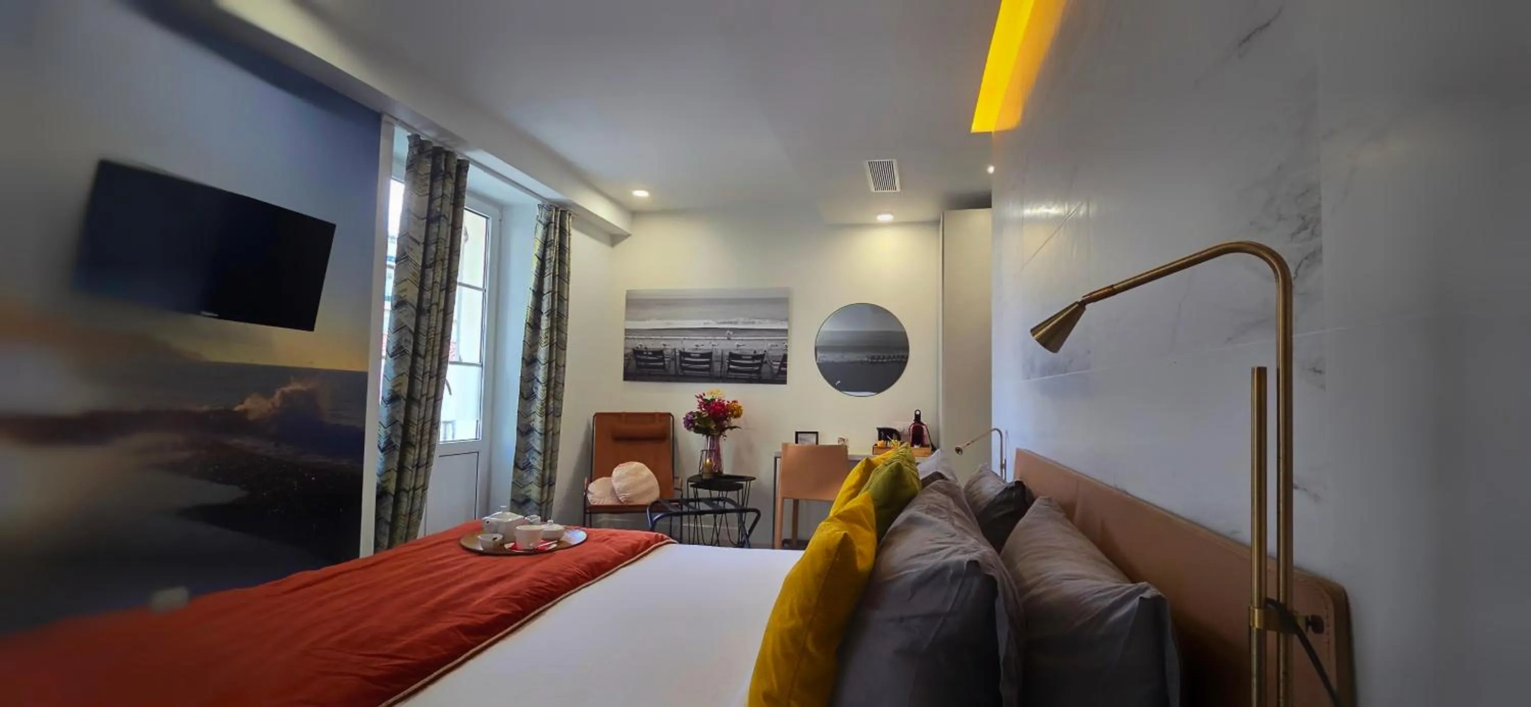 Bed in Le Petit Trianon et le Charme des Suites