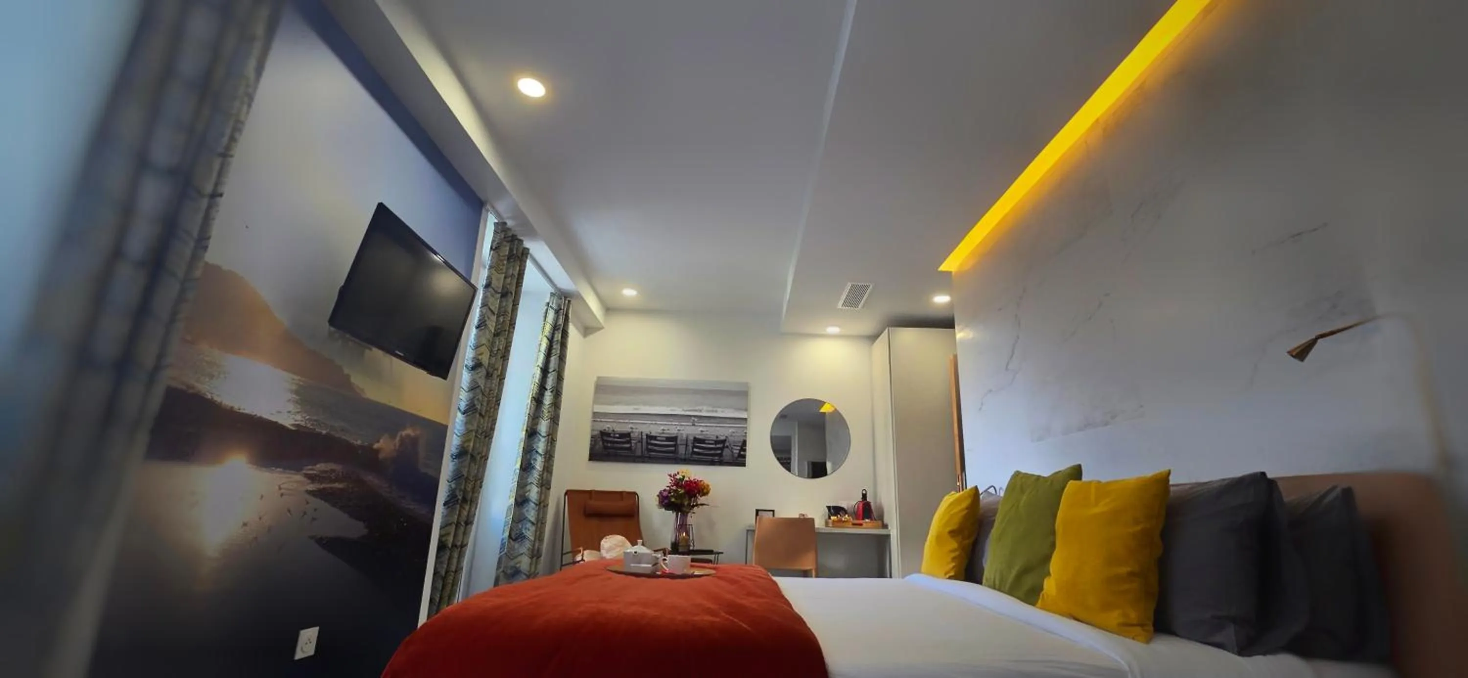 Bed in Le Petit Trianon et le Charme des Suites