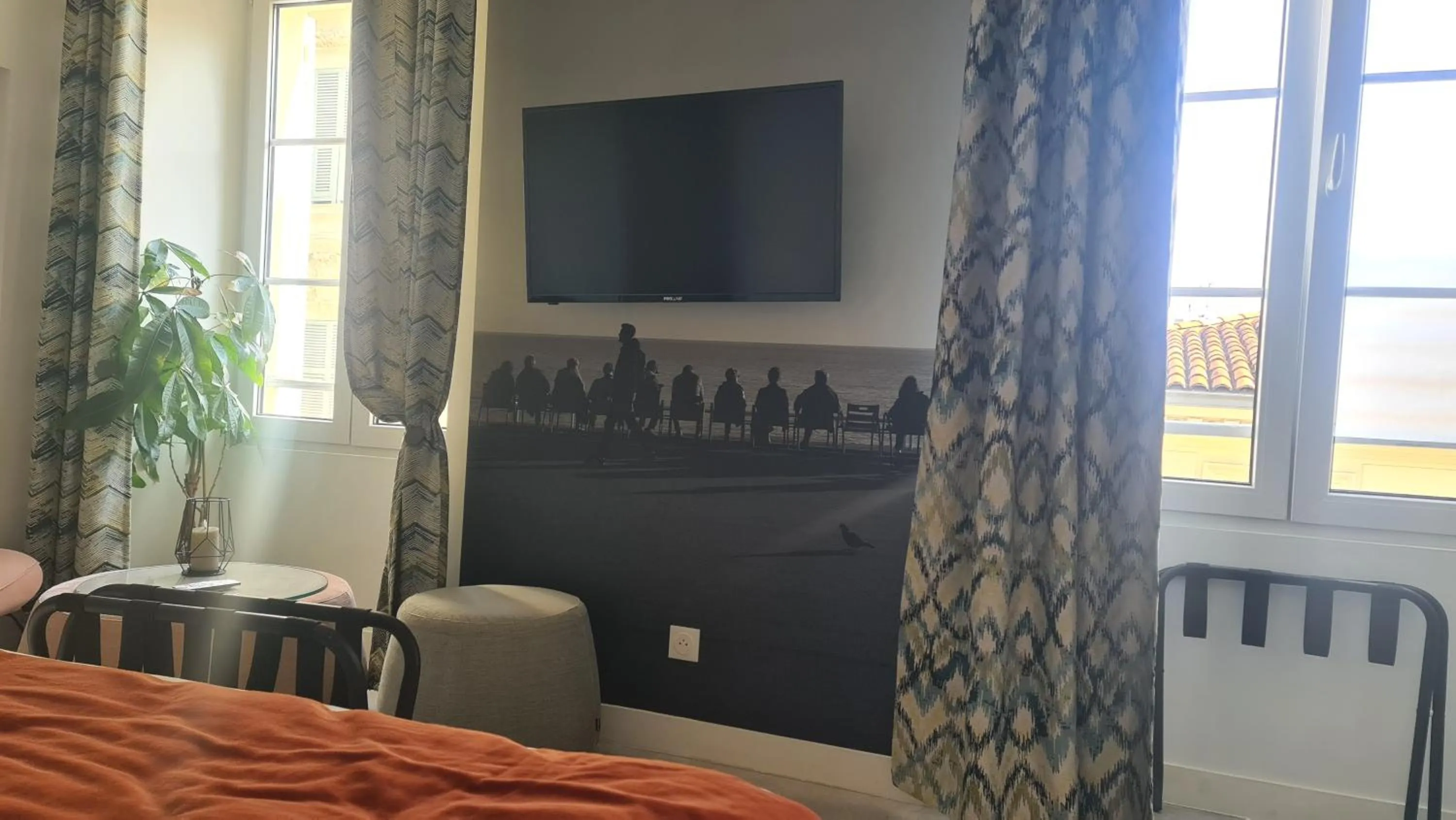 Bed in Le Petit Trianon et le Charme des Suites