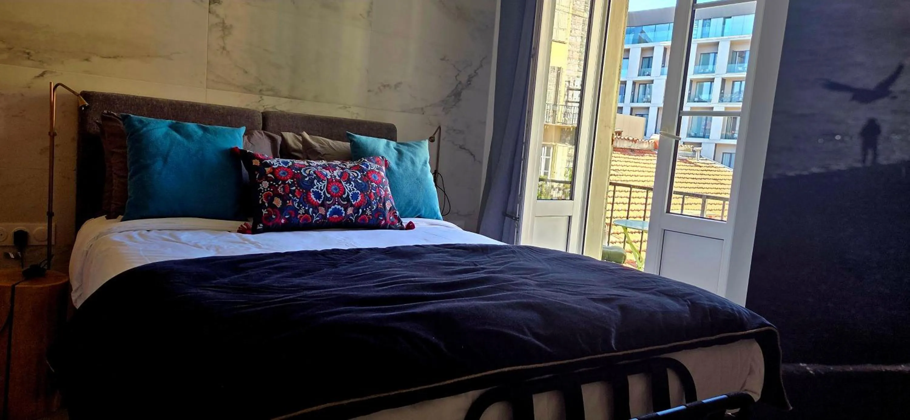 Bed in Le Petit Trianon et le Charme des Suites