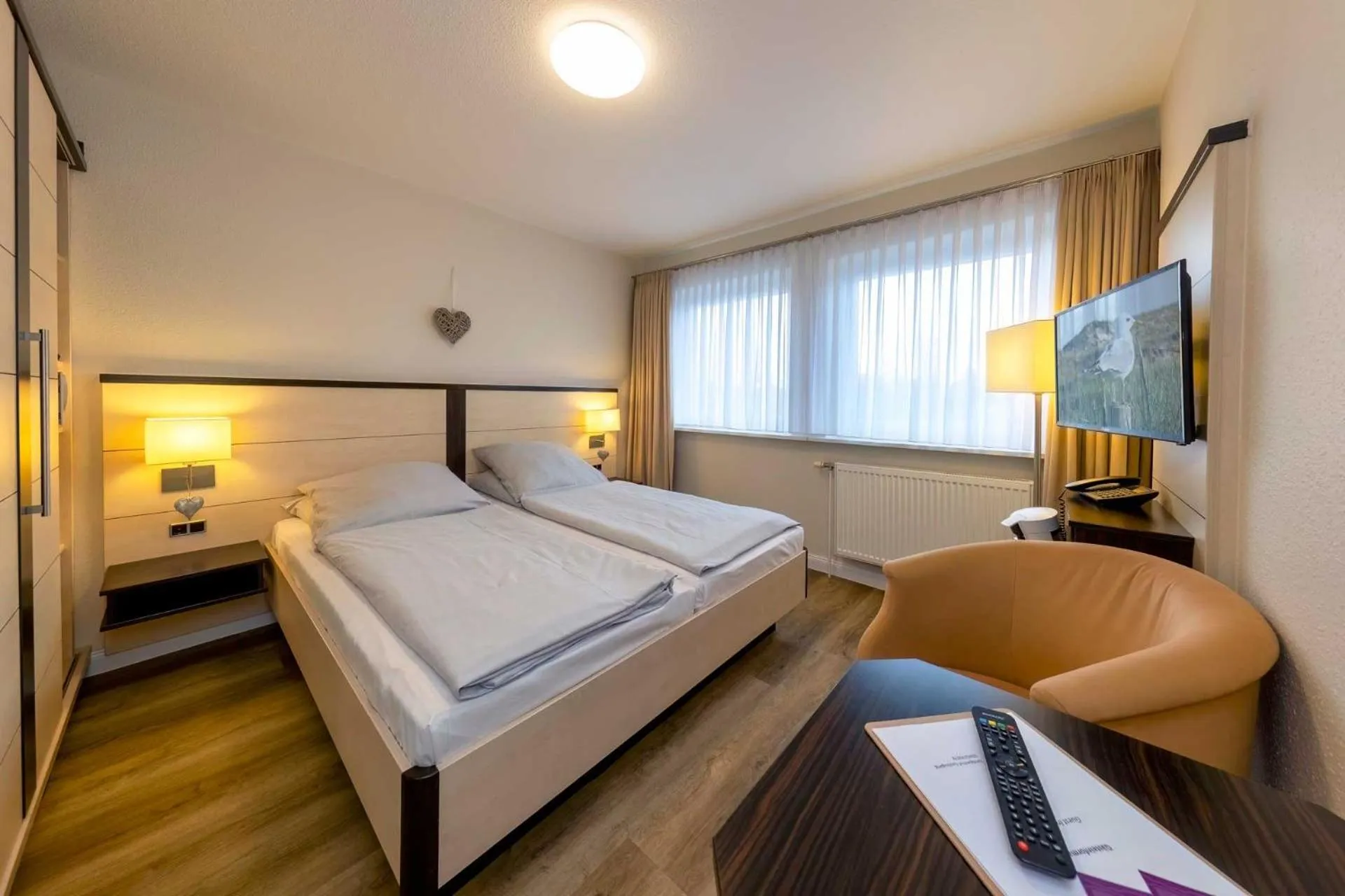 Photo of the whole room, Bed in Landgasthof Struckum