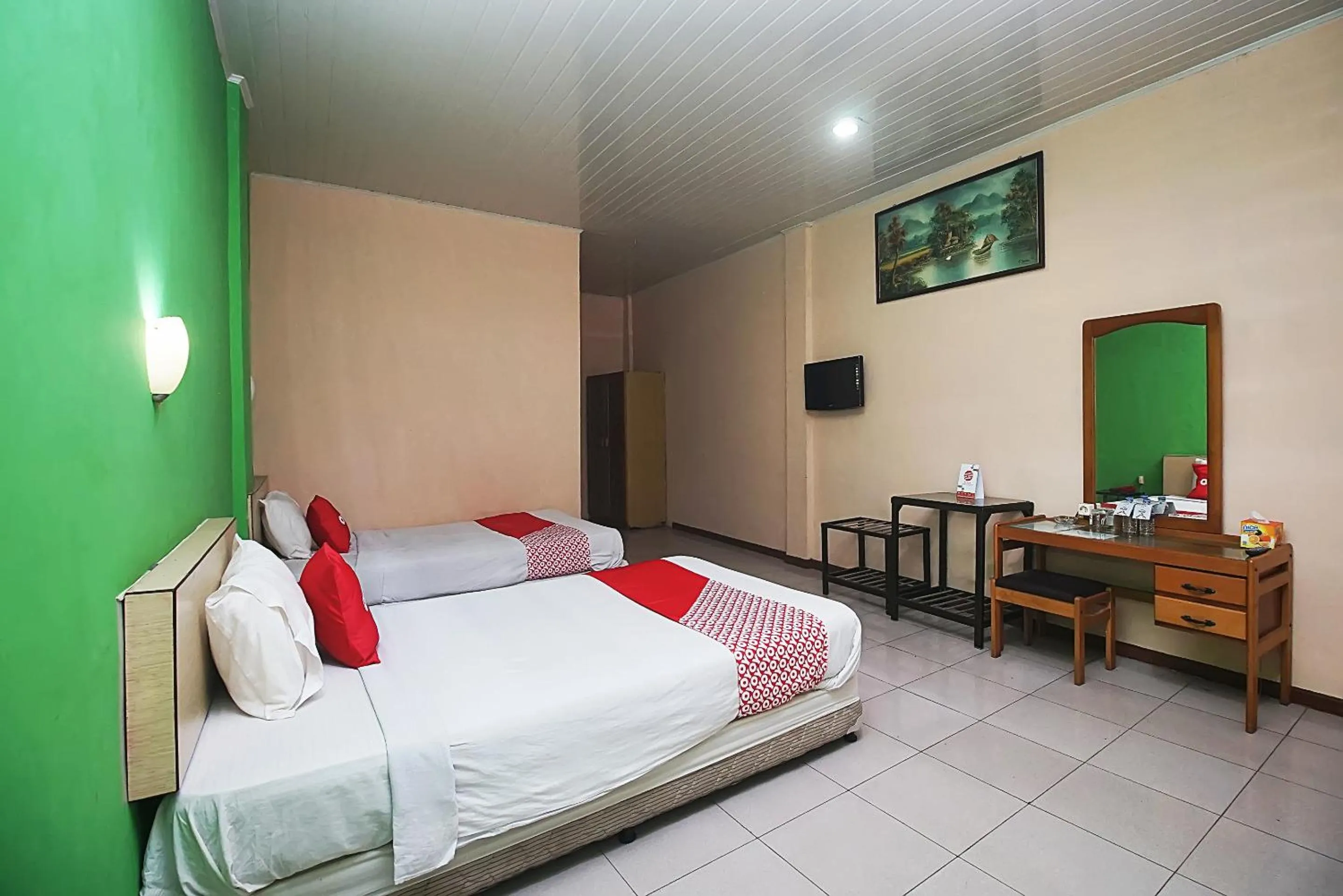 Bedroom in OYO 2079 Jambi Raya Hotel