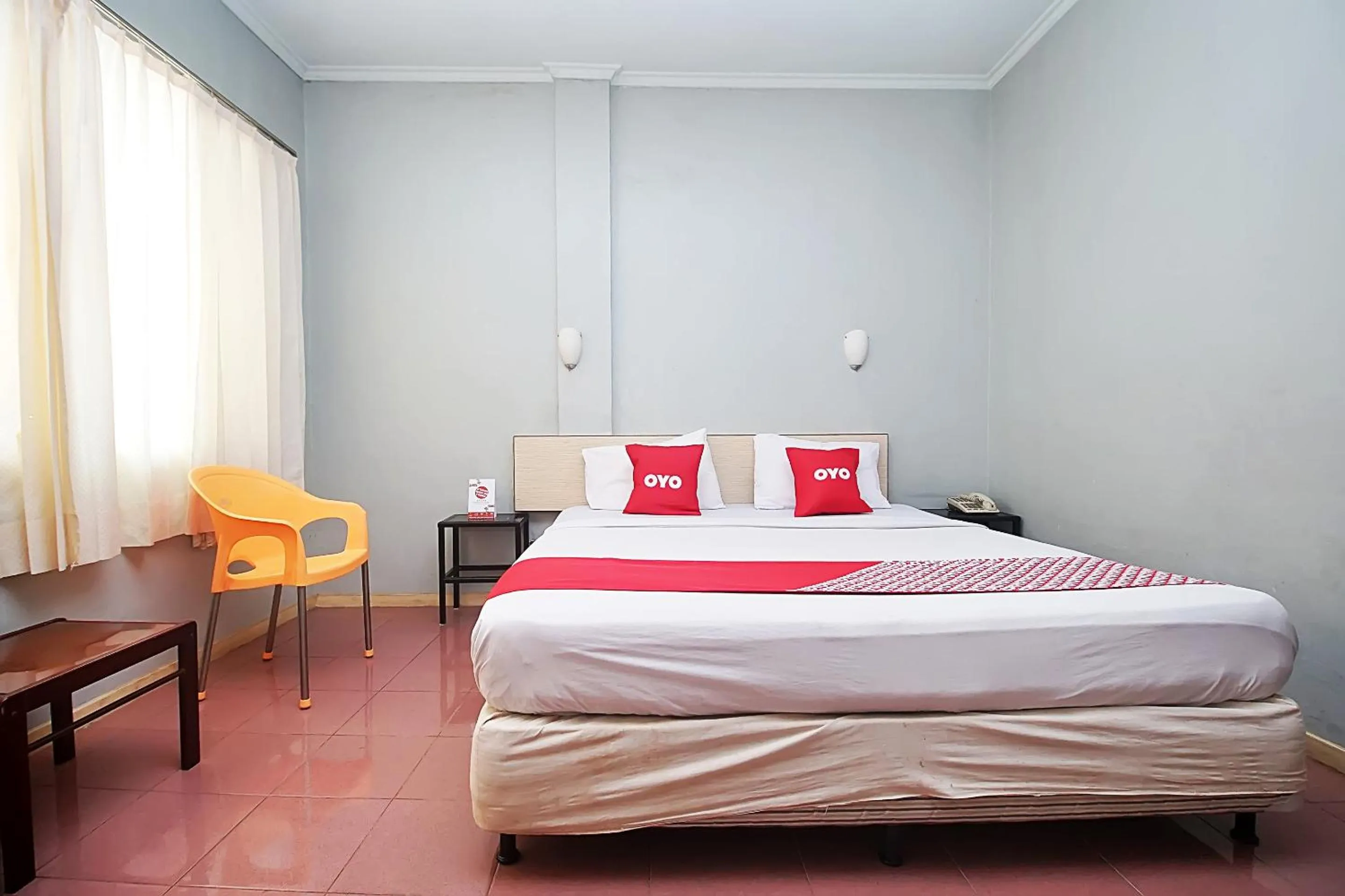 Bedroom in OYO 2079 Jambi Raya Hotel