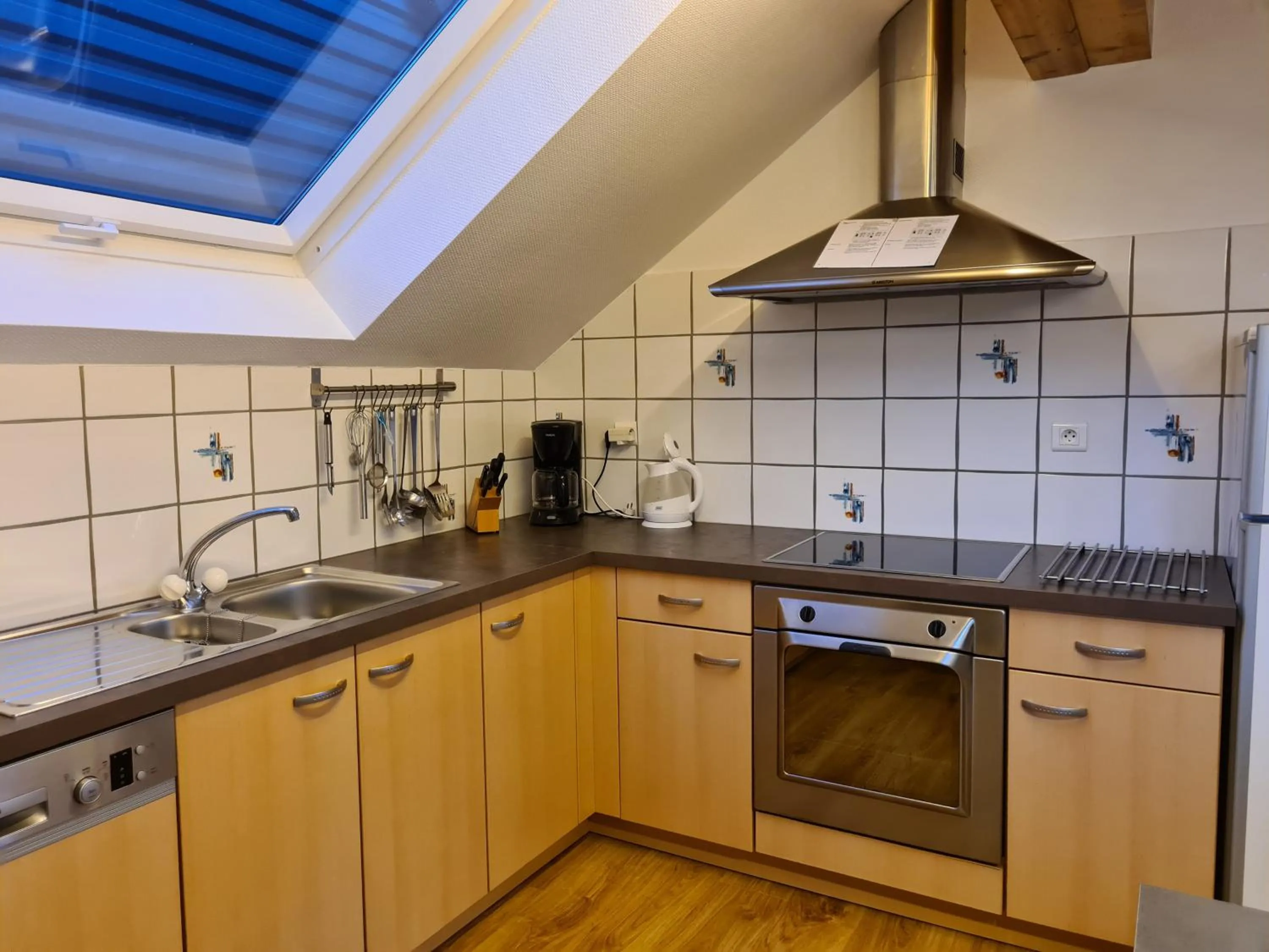 Kitchen or kitchenette in Gite des Merles