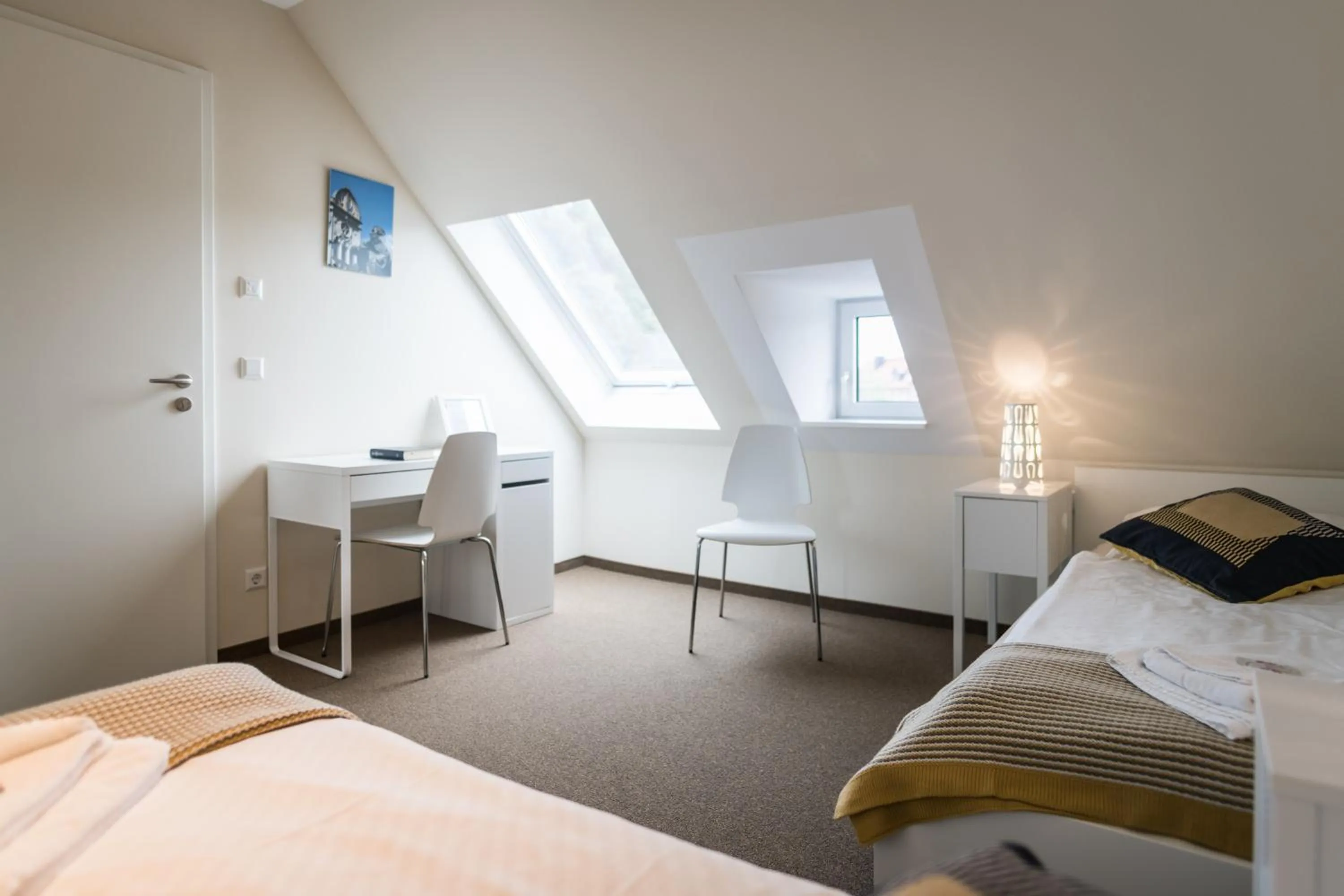 Photo of the whole room, Bed in Johanniterhaus Wittenberg