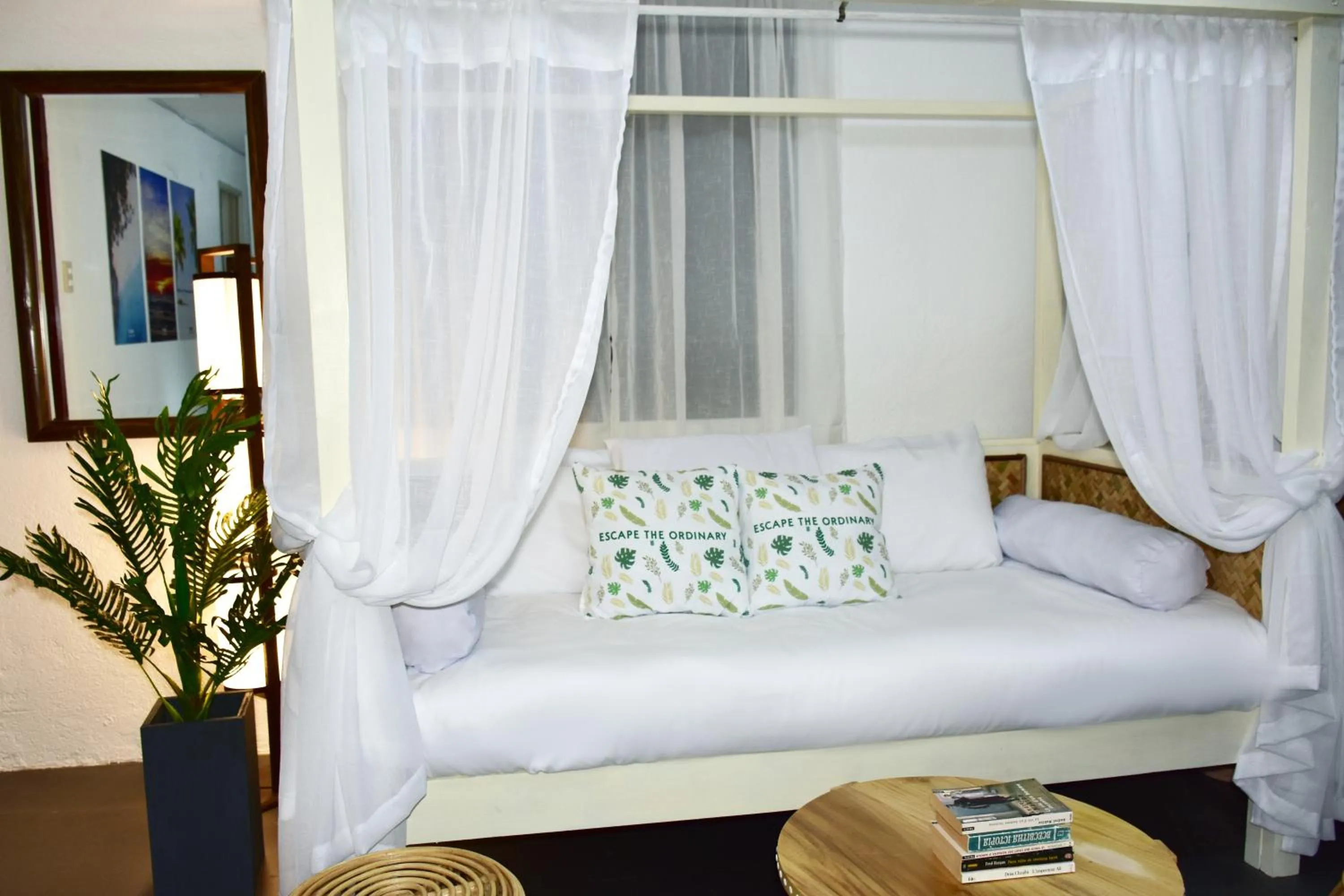Seating area, Bed in 8 Colors Penthouse Boracay Beach House Resort by Cocotel