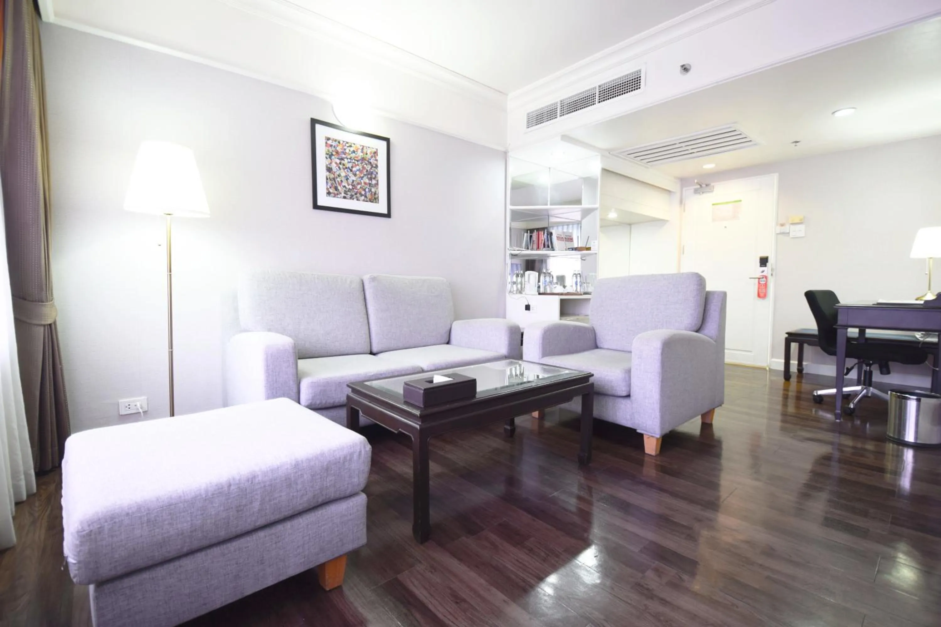 Living room in Le Siam Hotel Silom Bangkok by PCL