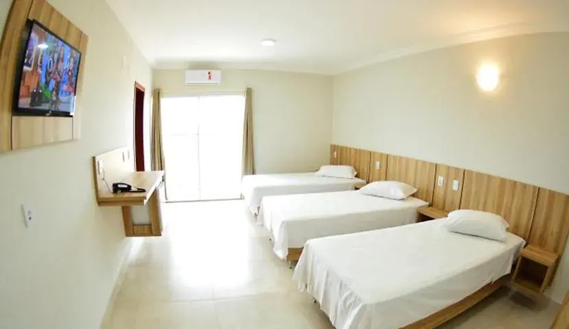 Comfort Triple Room in Dallas Palace Hotel Comfort Triple Room in Dallas Palace Hotel