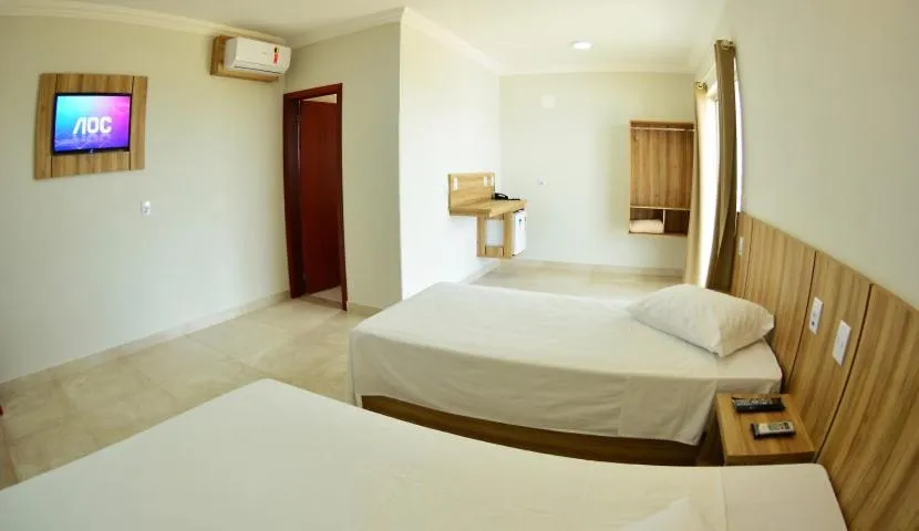 Bed in Dallas Palace Hotel