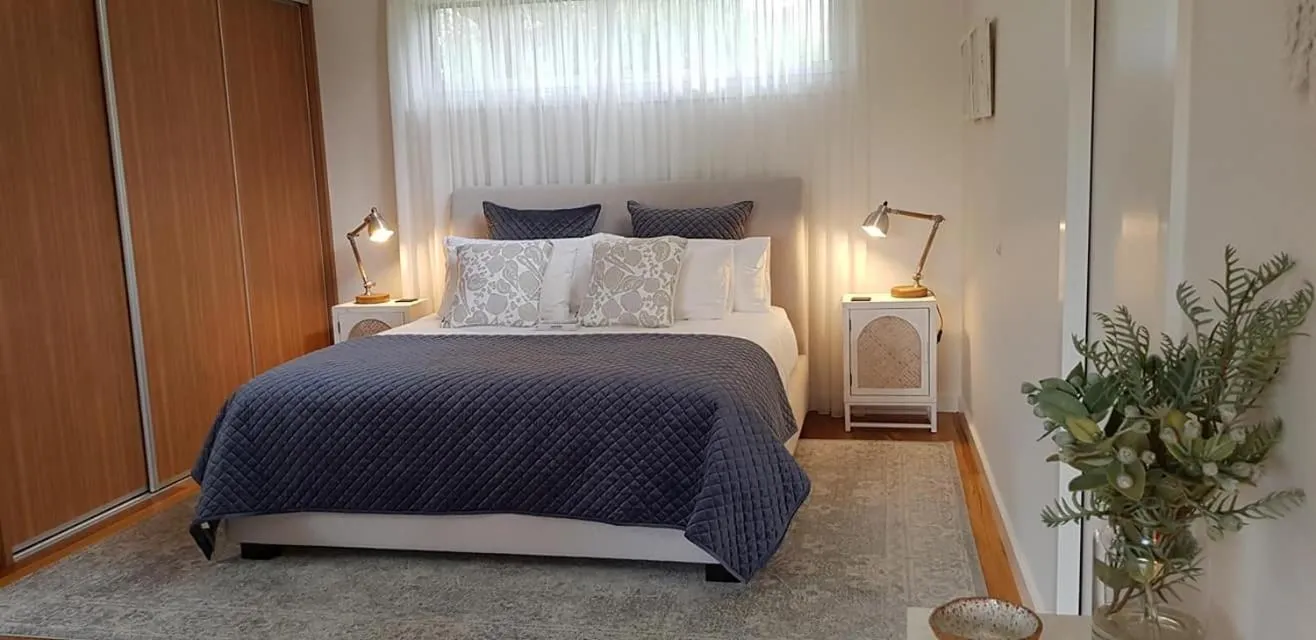 Bed in Messmates Luxury Eco Suites