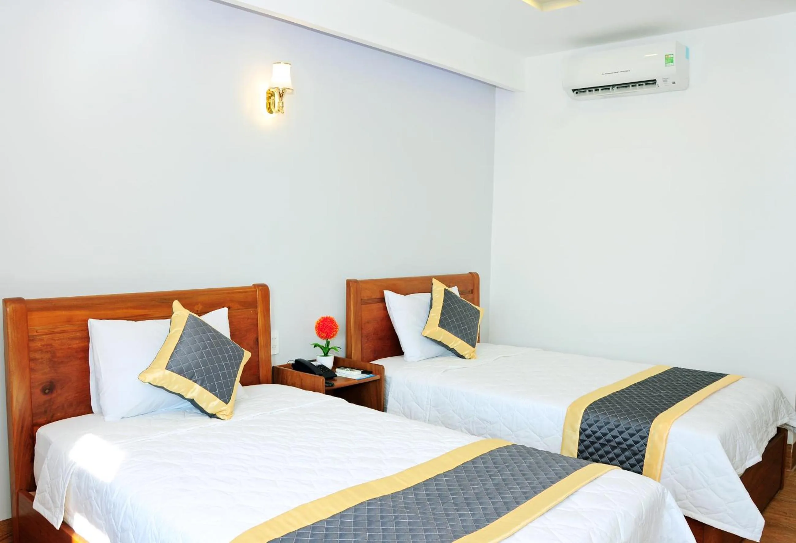 Bed in SEASIDE HOTEL