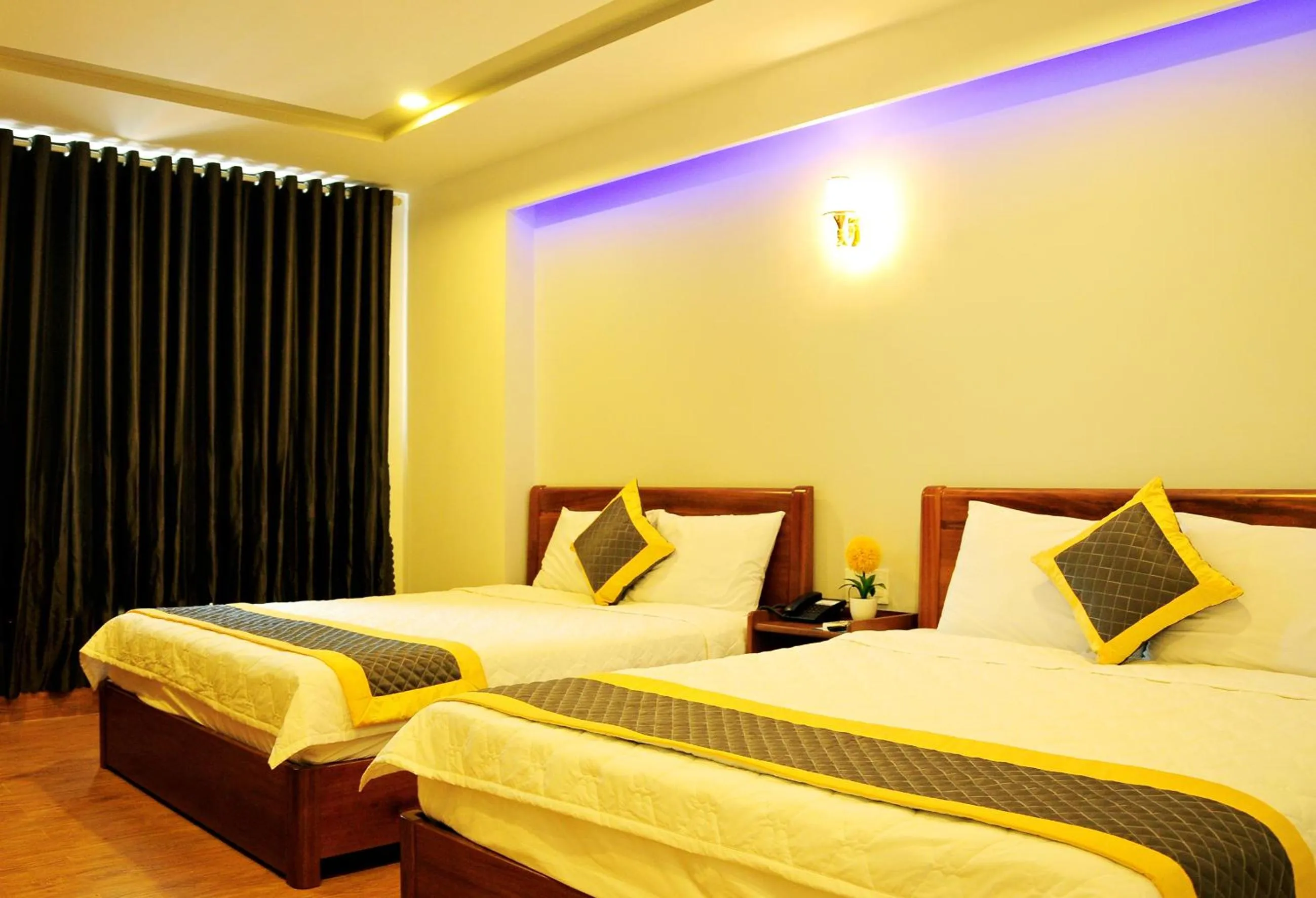 Bed in SEASIDE HOTEL