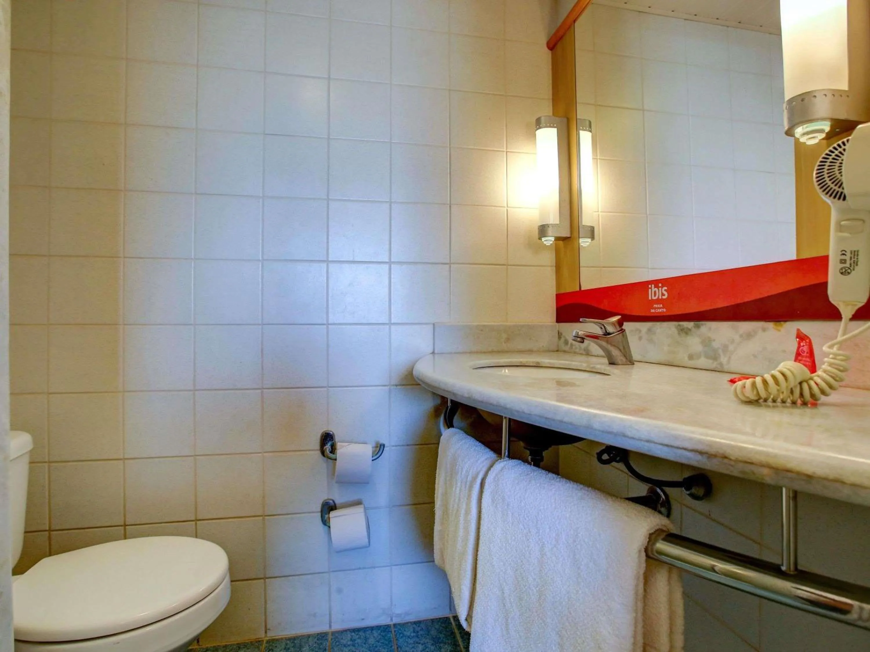 Bathroom in ibis Vitoria Praia do Canto