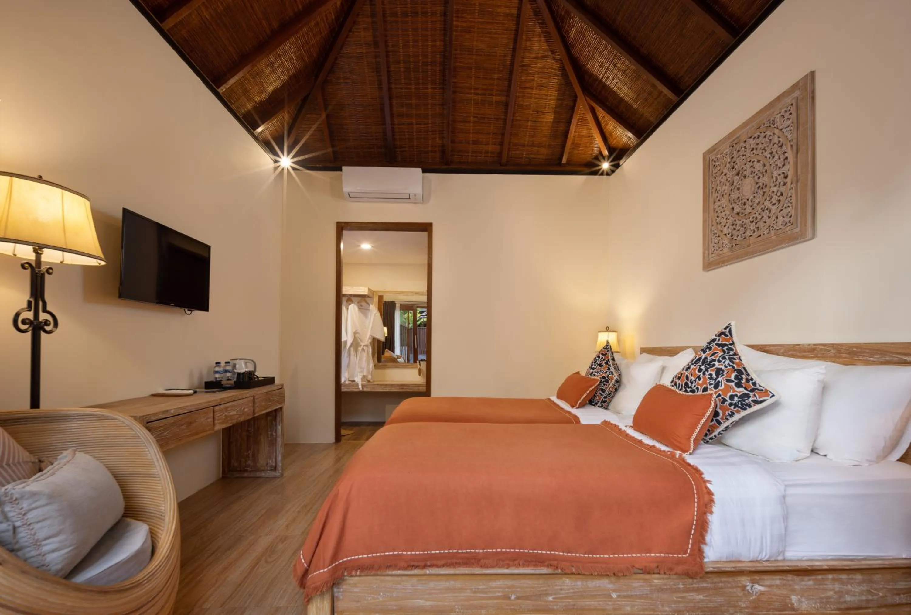 Bed in Pradja Slumbung Villas