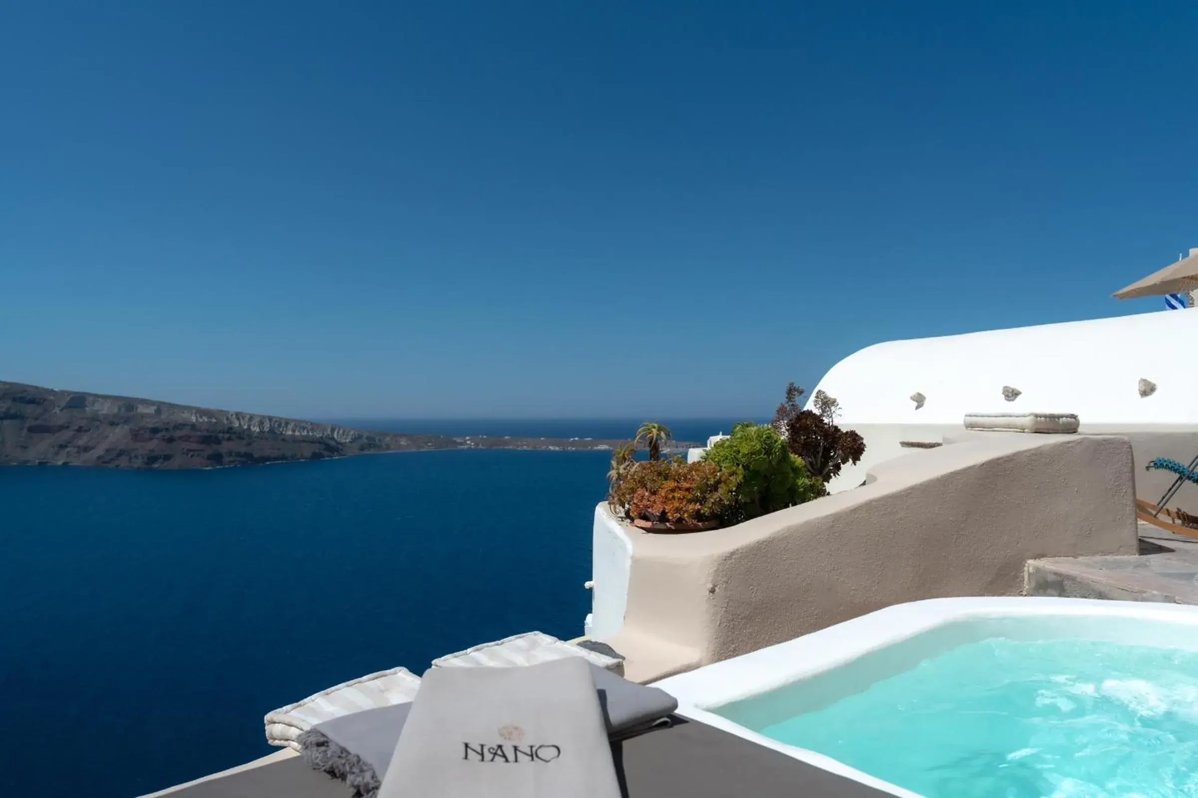 DELUXE VILLA WITH HOT JETTED TUB & SUNSET VIEW in Nano Oia Villas DELUXE VILLA WITH HOT JETTED TUB & SUNSET VIEW in Nano Oia Villas