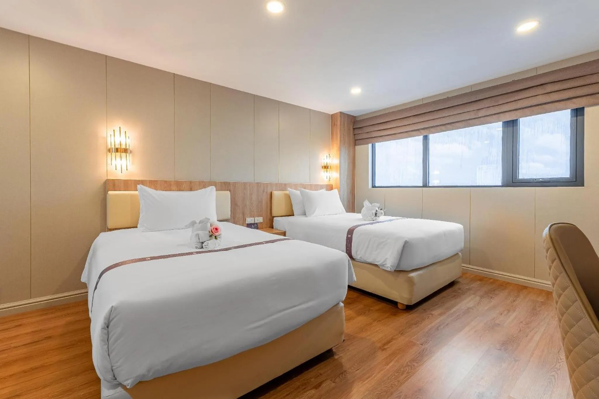 Bed in Golden Jomtien Beach Hotel