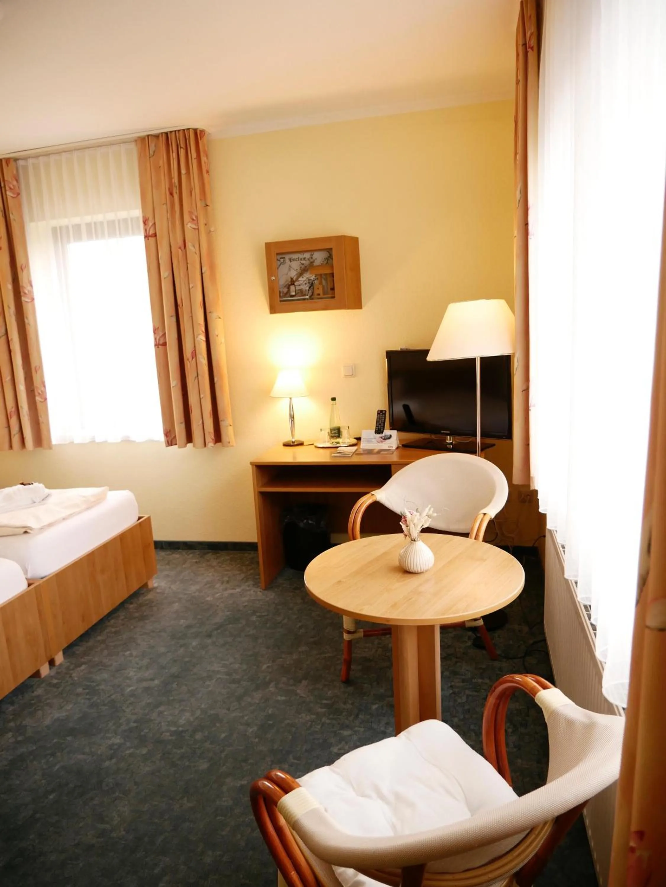 Seating area, Bed in Hotel Waldesruh