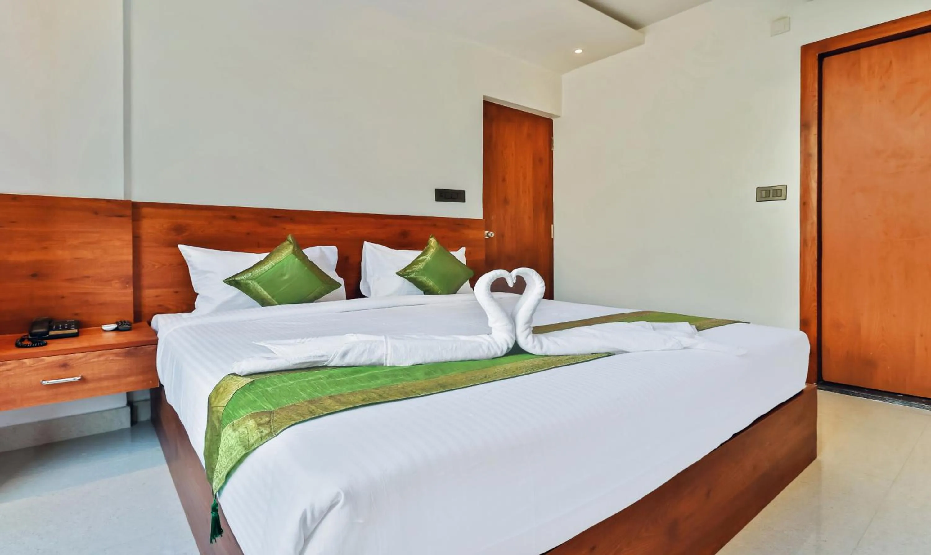 Bedroom, Bed in Treebo Blu Orchid