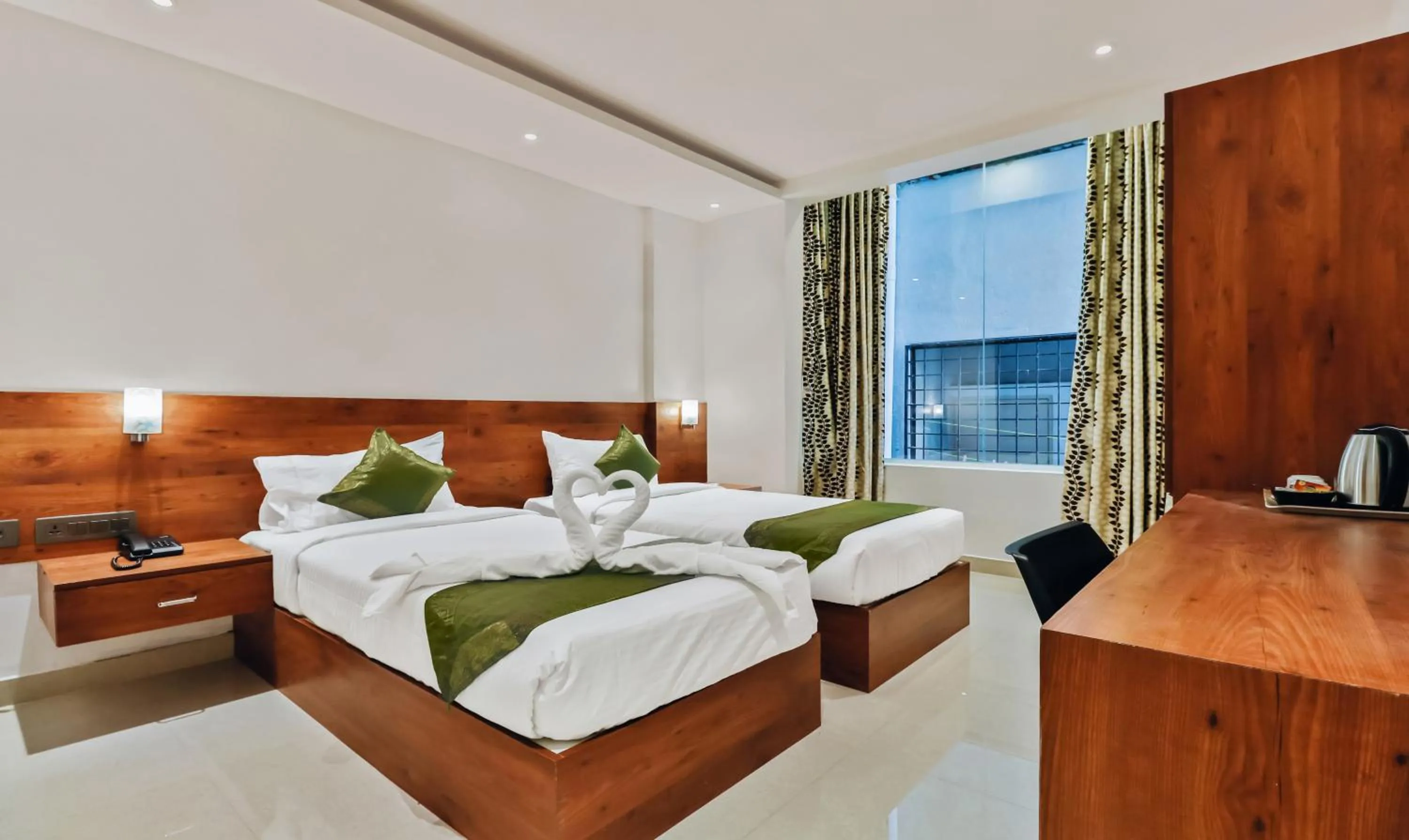 Bedroom, Bed in Treebo Blu Orchid