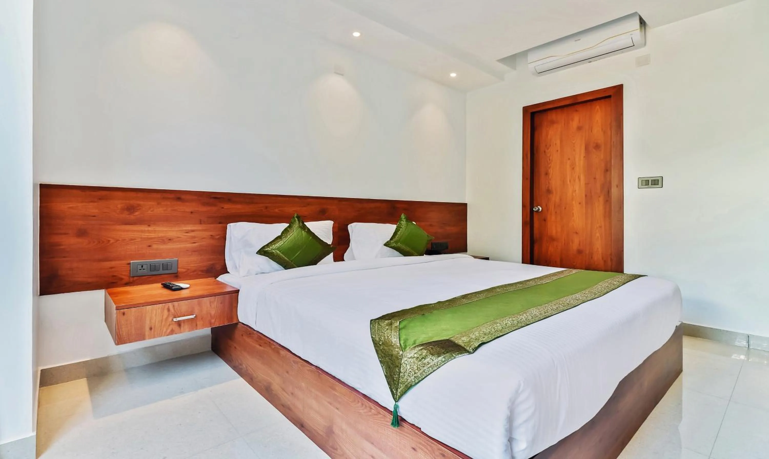 Bedroom, Bed in Treebo Blu Orchid