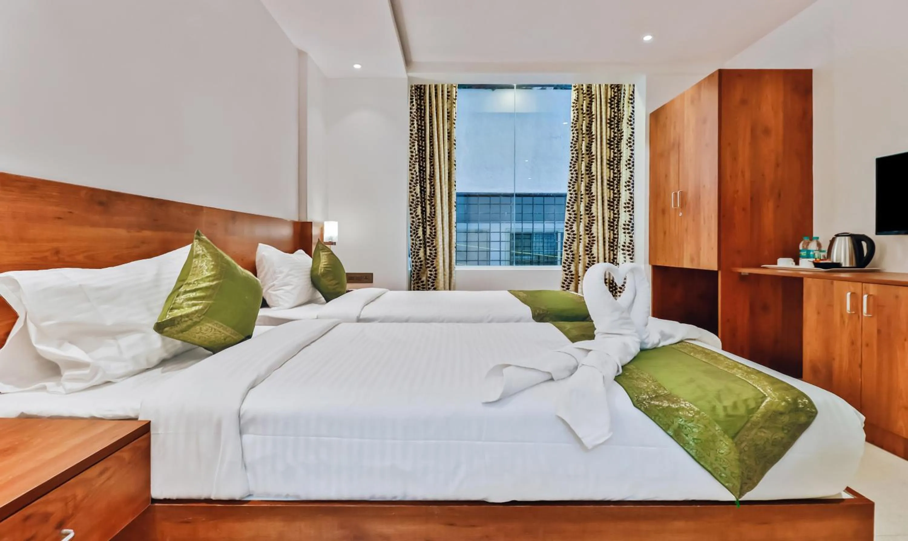 Bedroom, Bed in Treebo Blu Orchid